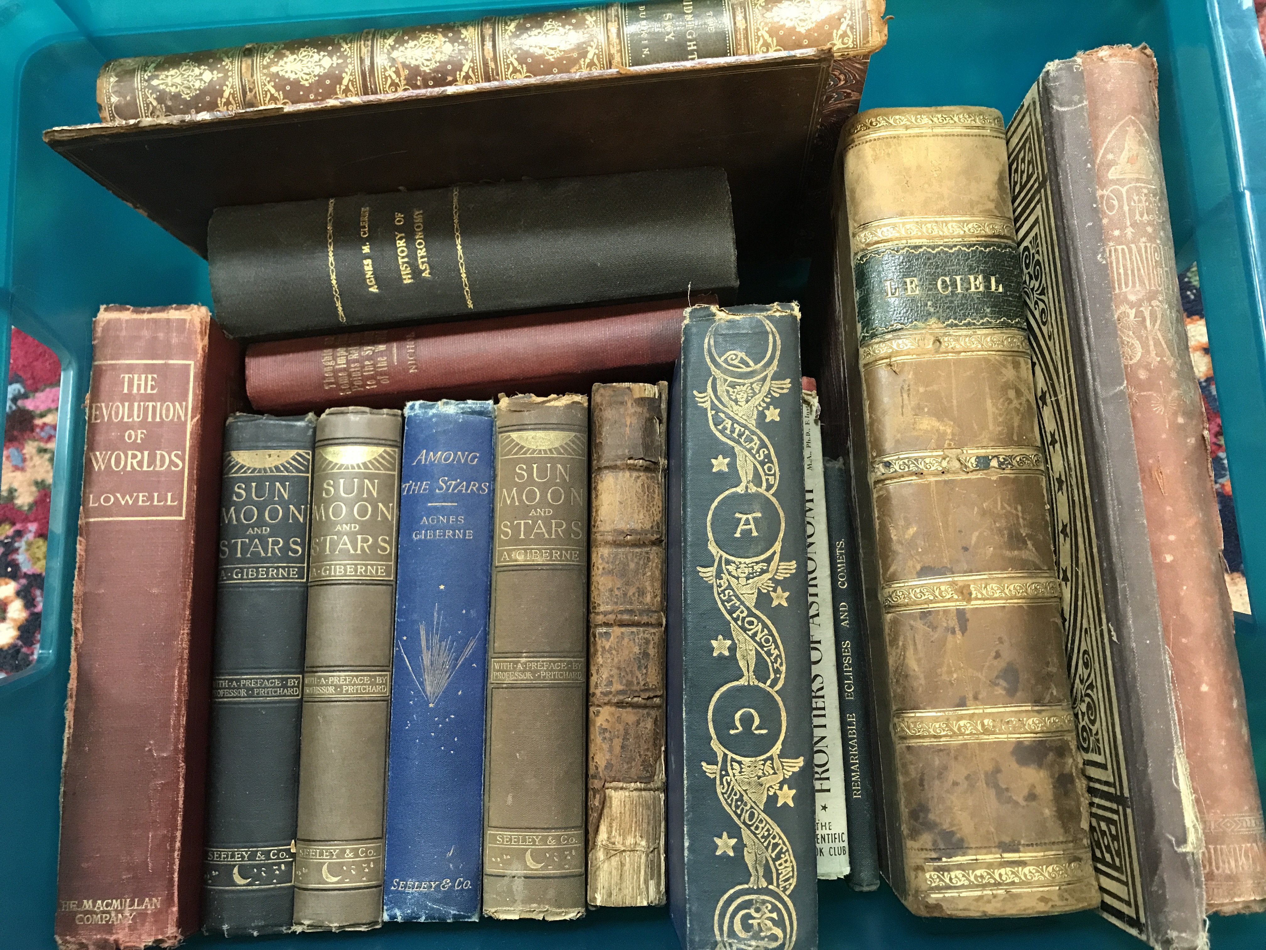 A collection of vintage leather bound astronomy books including Le Ciel by Amedee Guillemin, An Atlas of Astronomy by Robert Stawell Ball, The midnight sky by Edwin Dunkin, survey of the heavens by W.Derham, Sun moon and stars by Agnes Giberne etc. postage category C