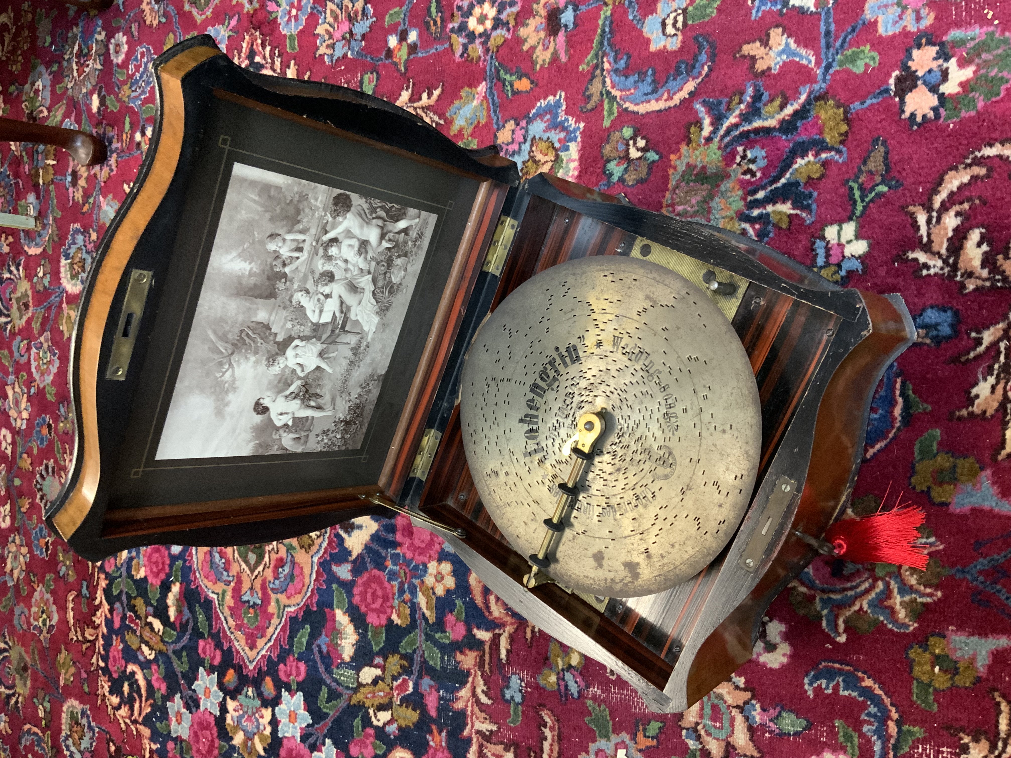 A 19th Century walnut cased Polyphone music box with 10 additional discs. (D)