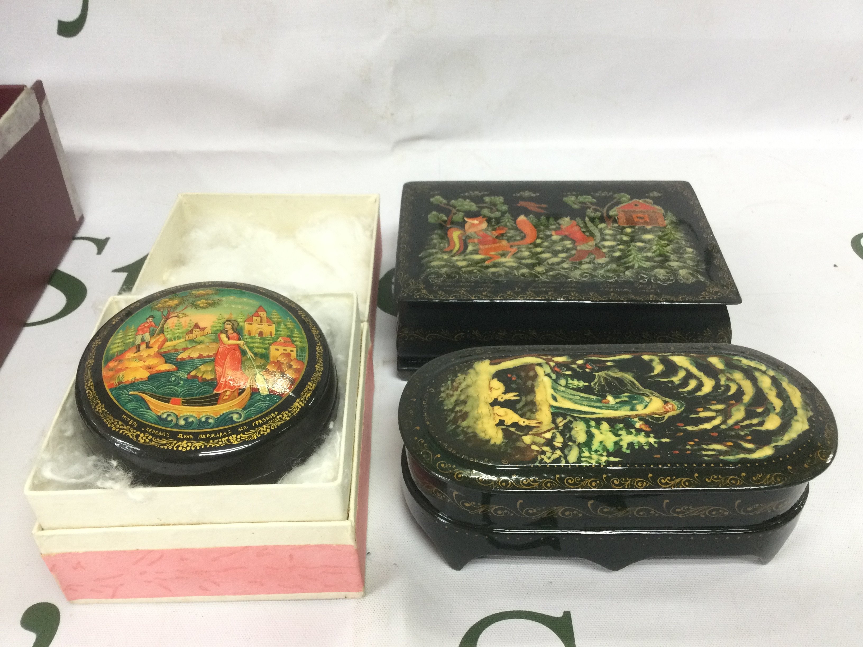 Three Russian laqcuered trinket boxes. Shipping category B.