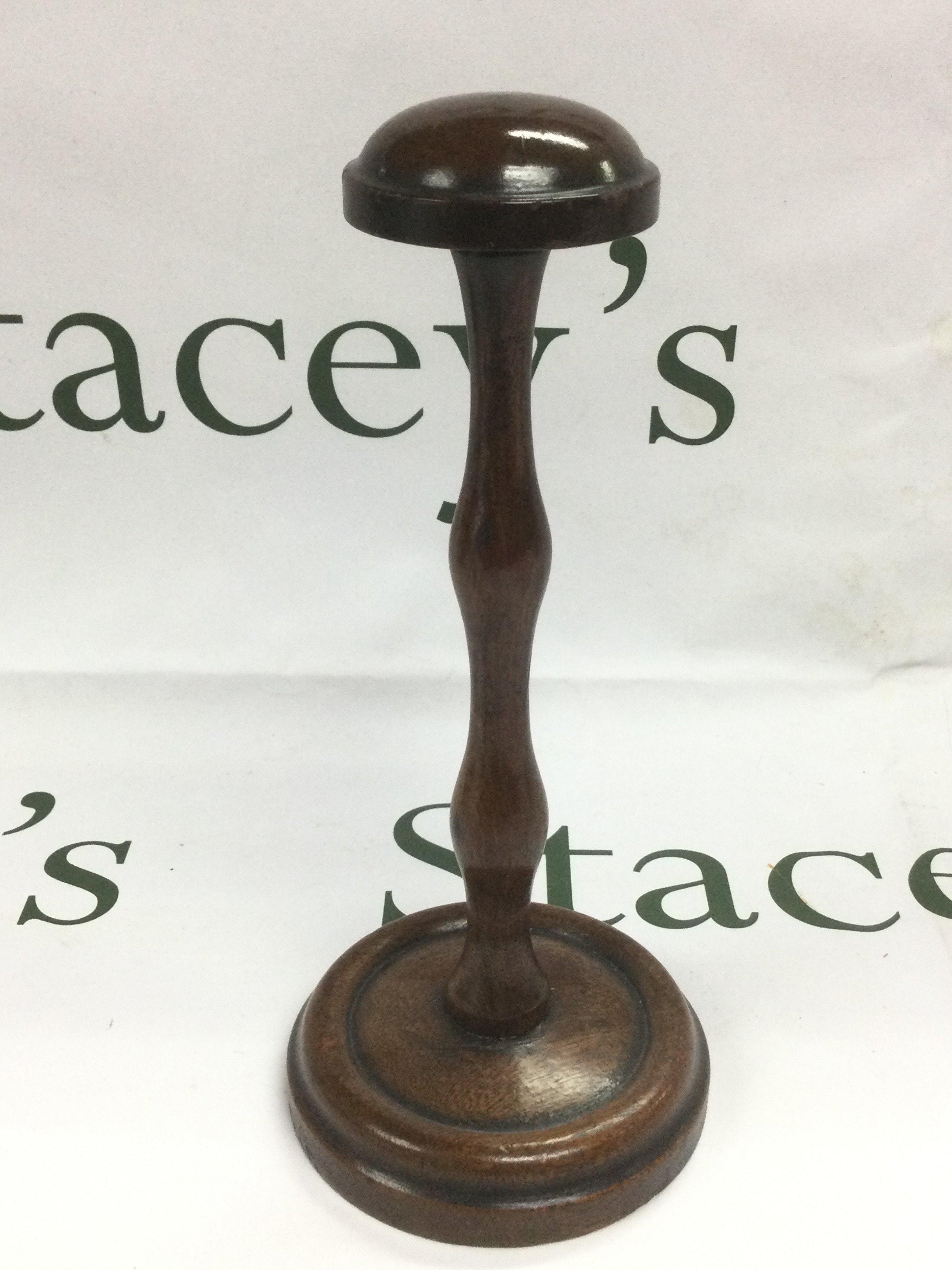 A mahogany wig stand, approx height 23.5cm. Shipping category B.