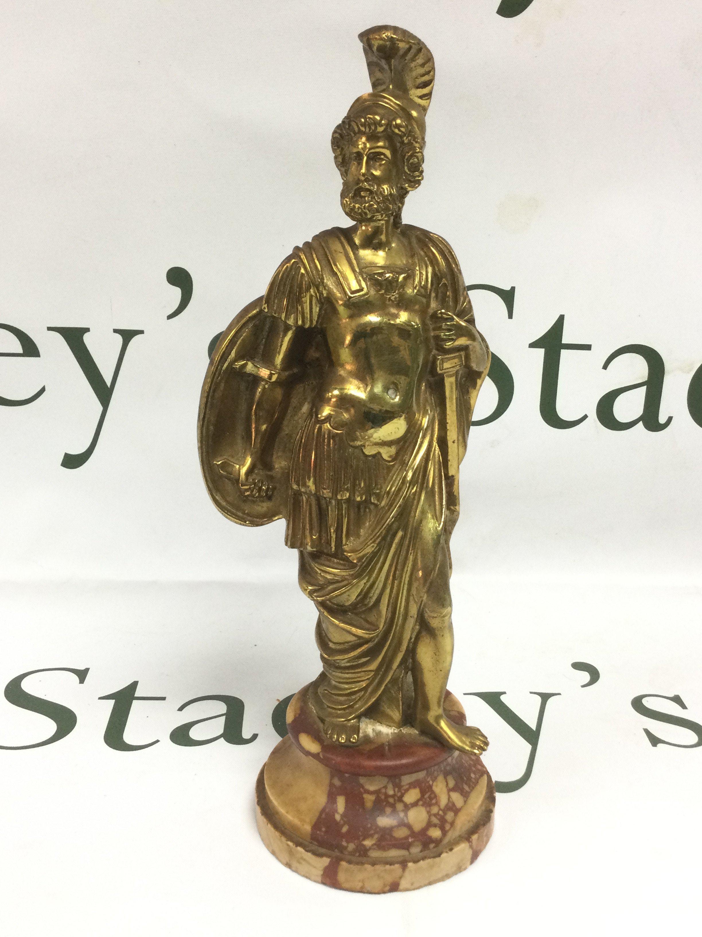 A gilt bronze and marble Centurion figure, approx height 24cm. Shipping category B.