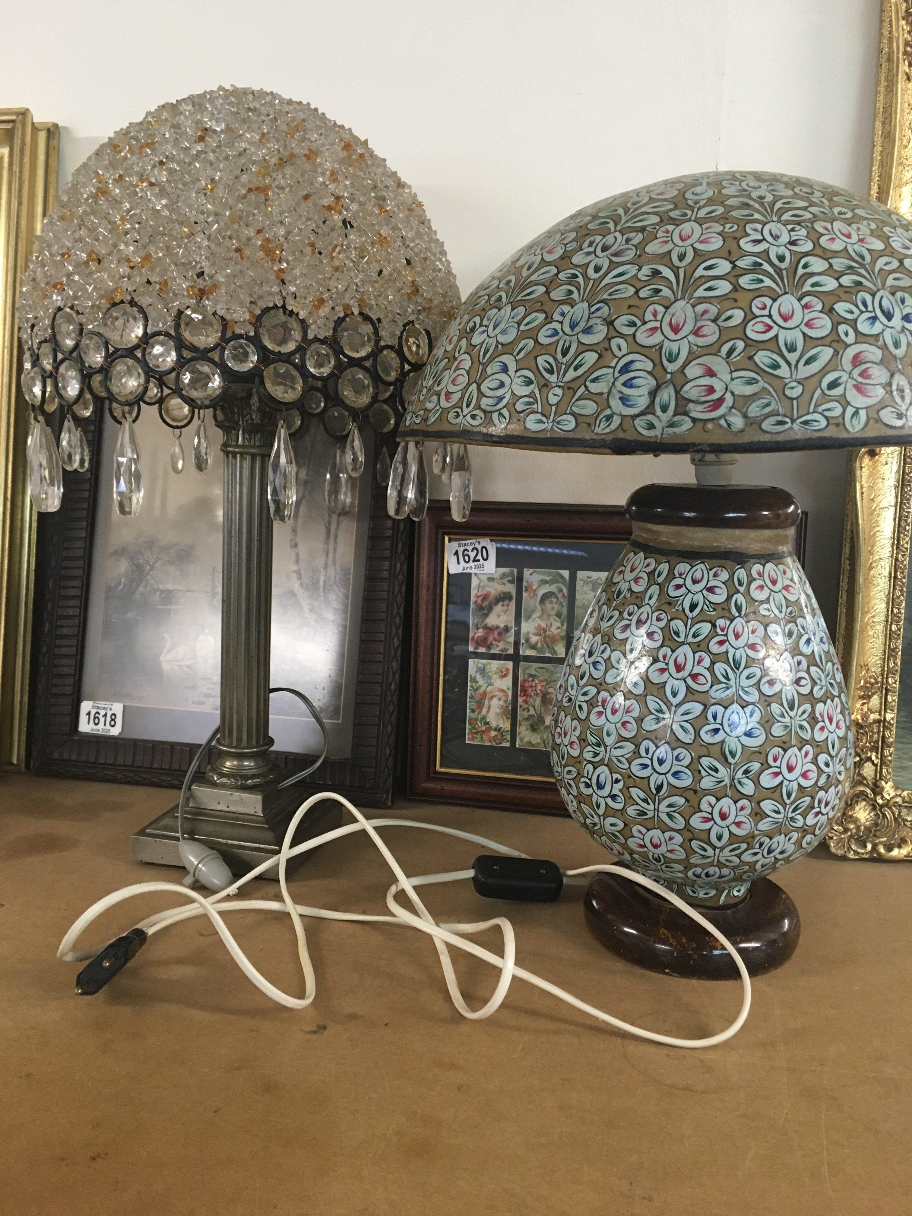 Two side lamps one shade with glass drops .