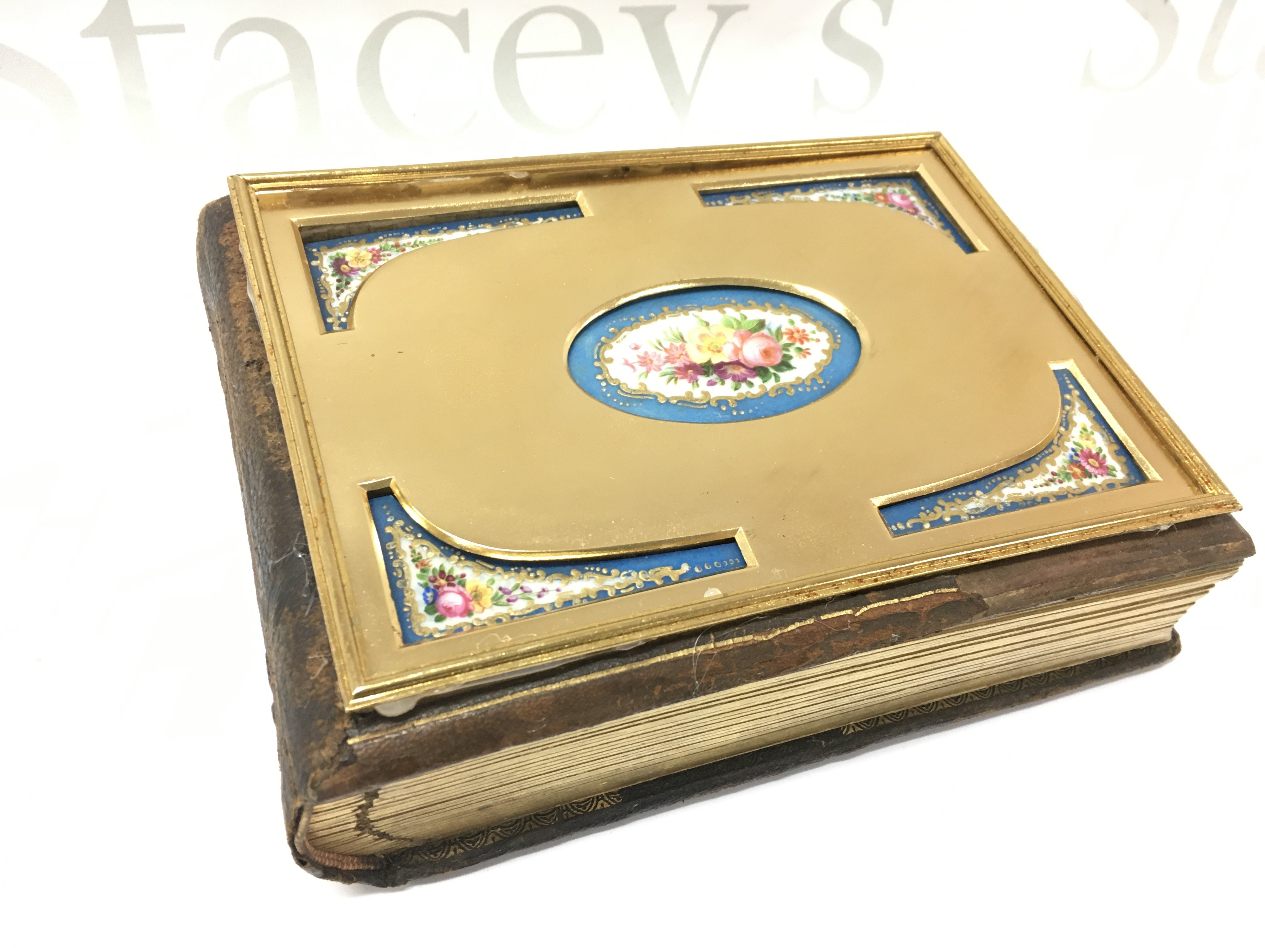 A Victorian leather, porcelain and brass photo album . Postage category b