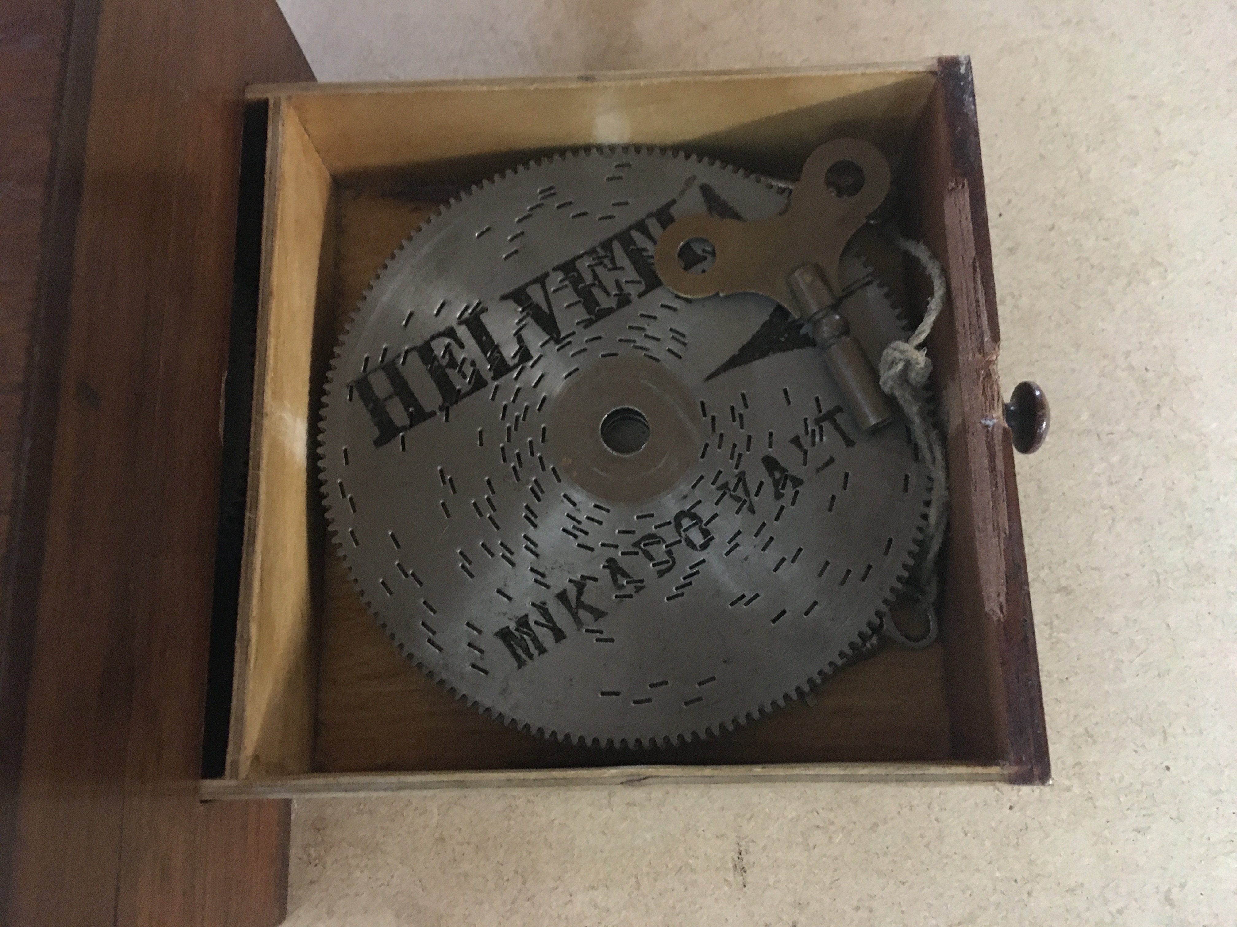 WITHDRAWN - A small mahogany musical box .