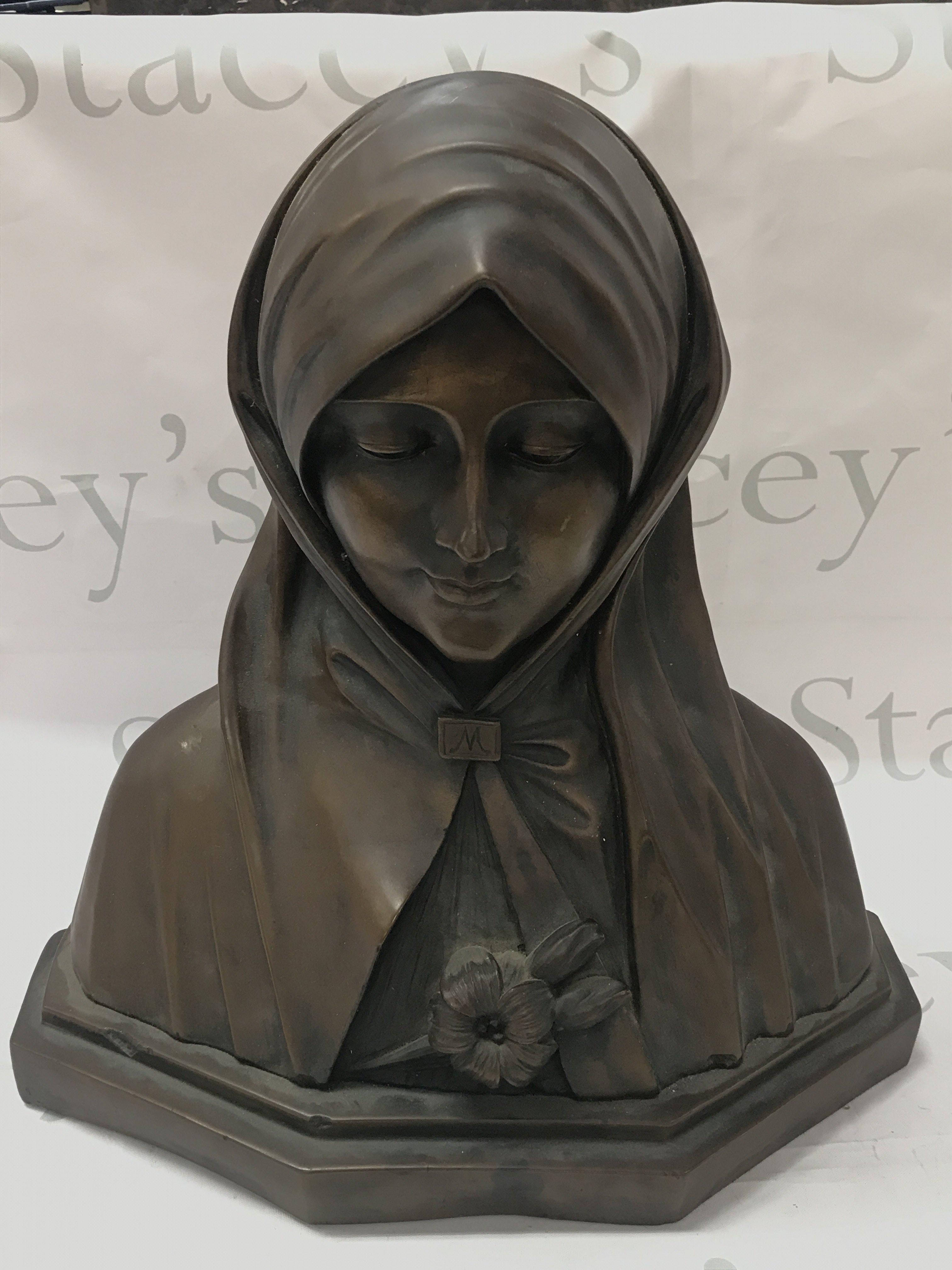 A cold composition bust of Virgin Mary. 36cm tall. Postage category C