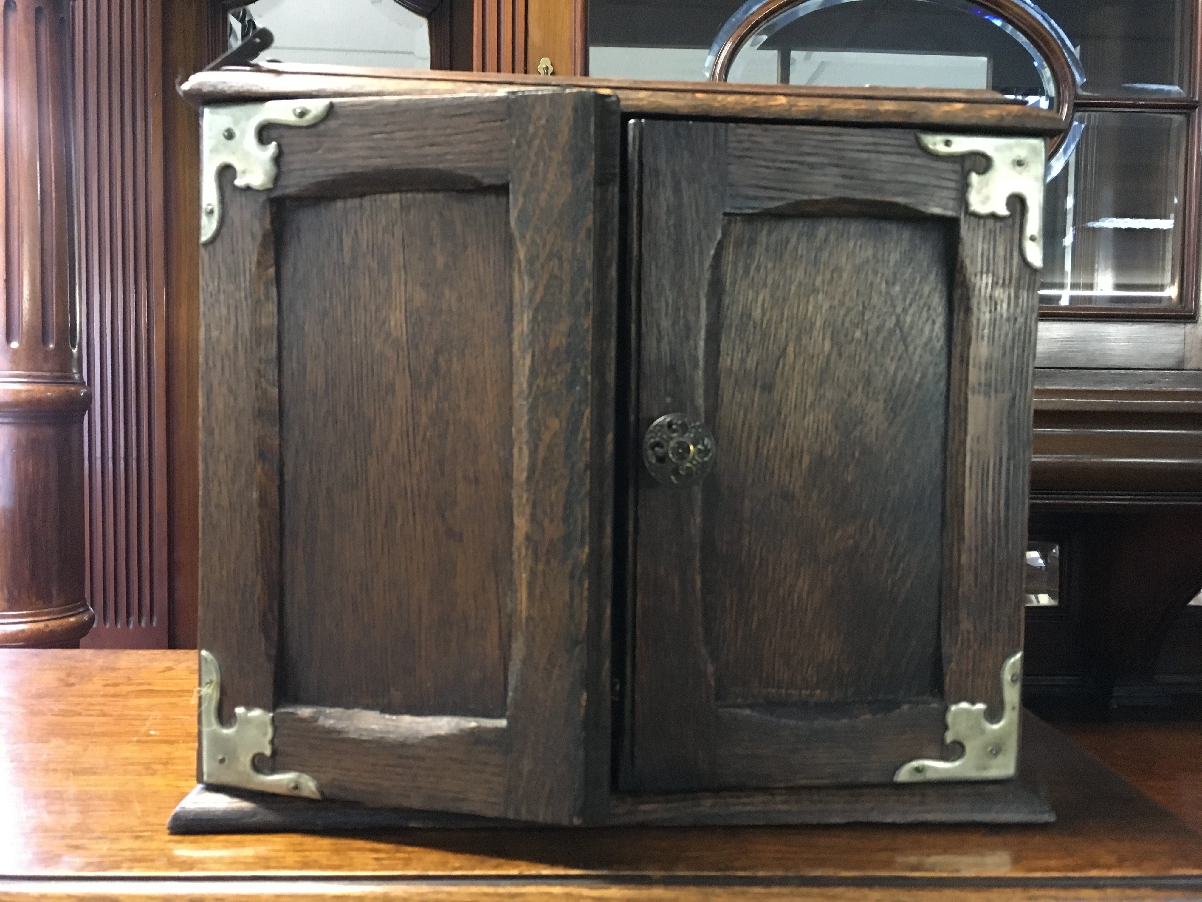 An oak smokers cabinet , dimensions 20x32x28cm