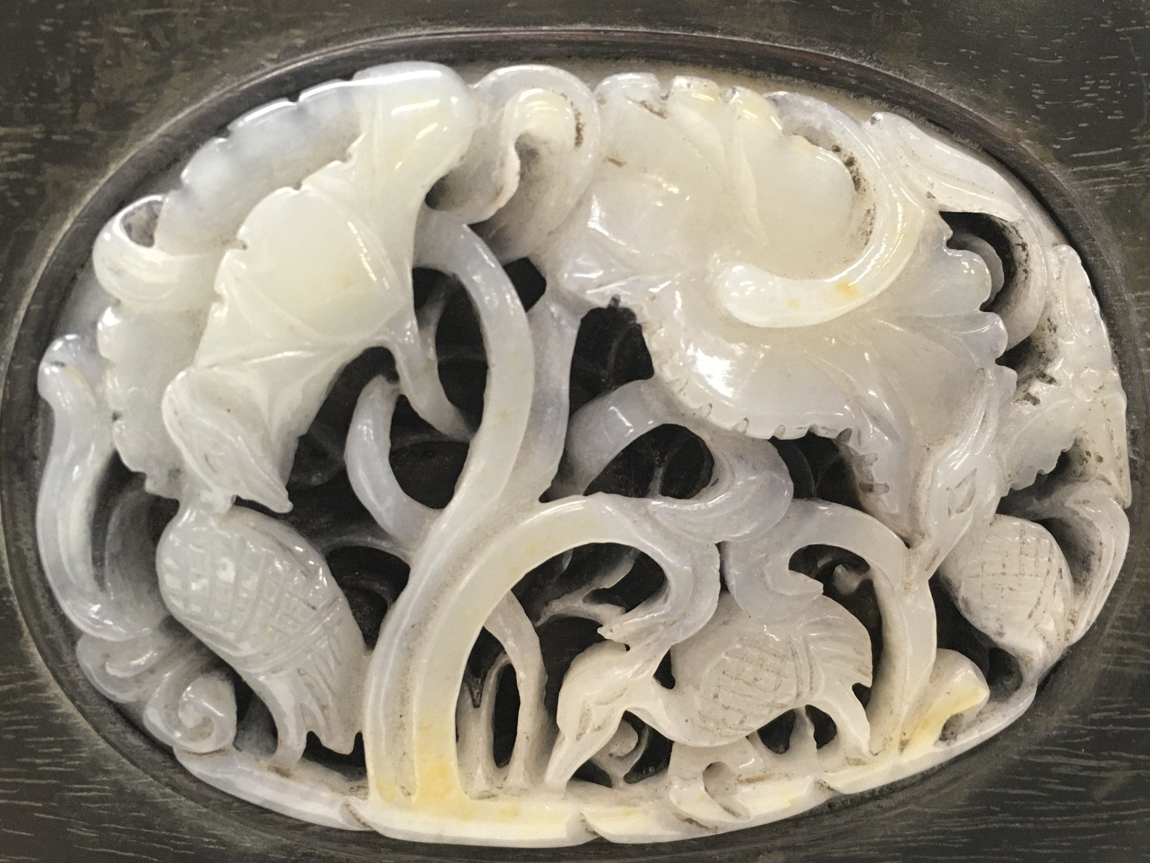 A Chinese wooden screen inlaid with jade ,birds with flowers piece. 25cm wide 25cm tall.