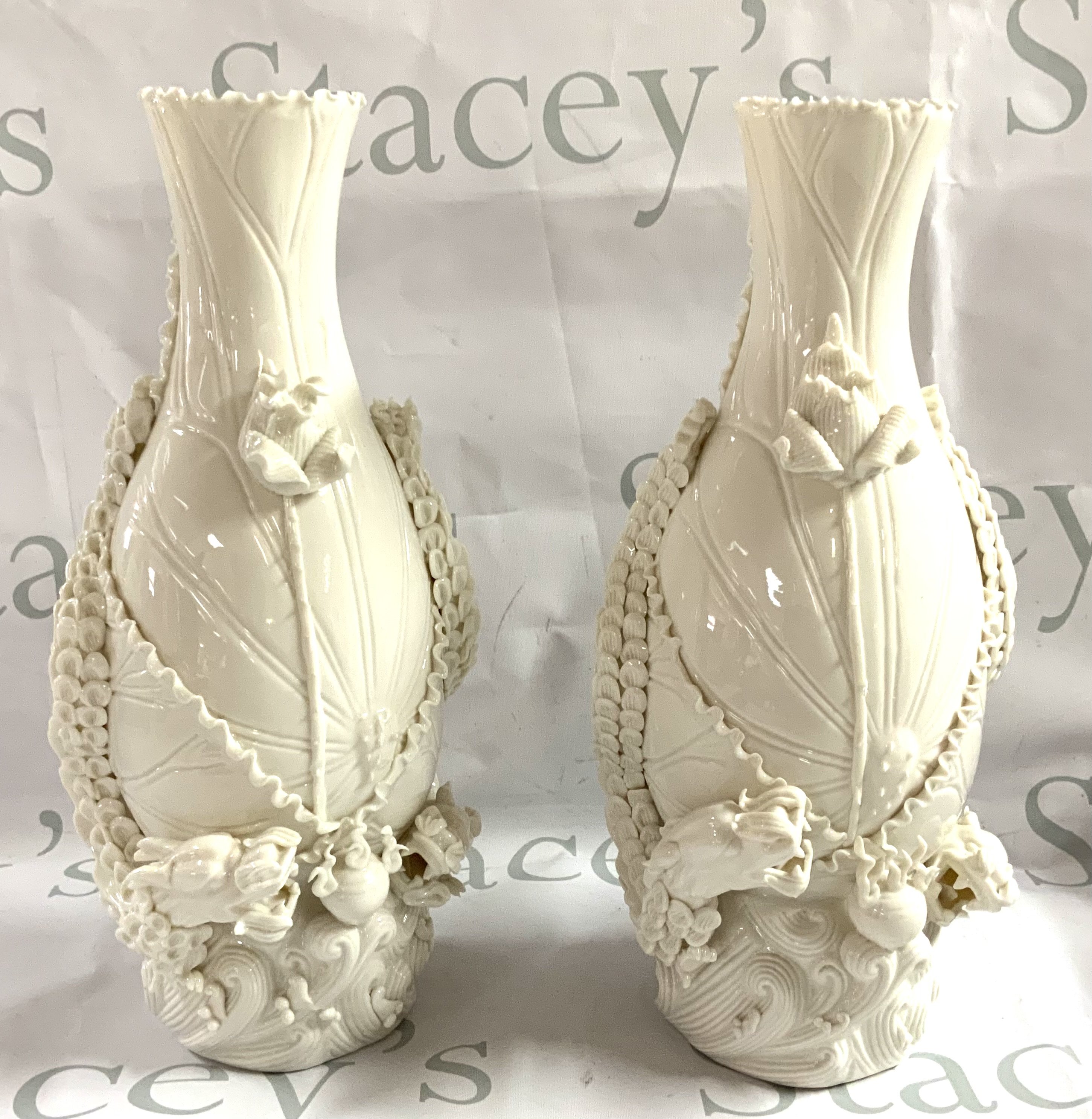 A pair of Chinese white porcelain decorated with dragons ands pearls. 35cm. (D)