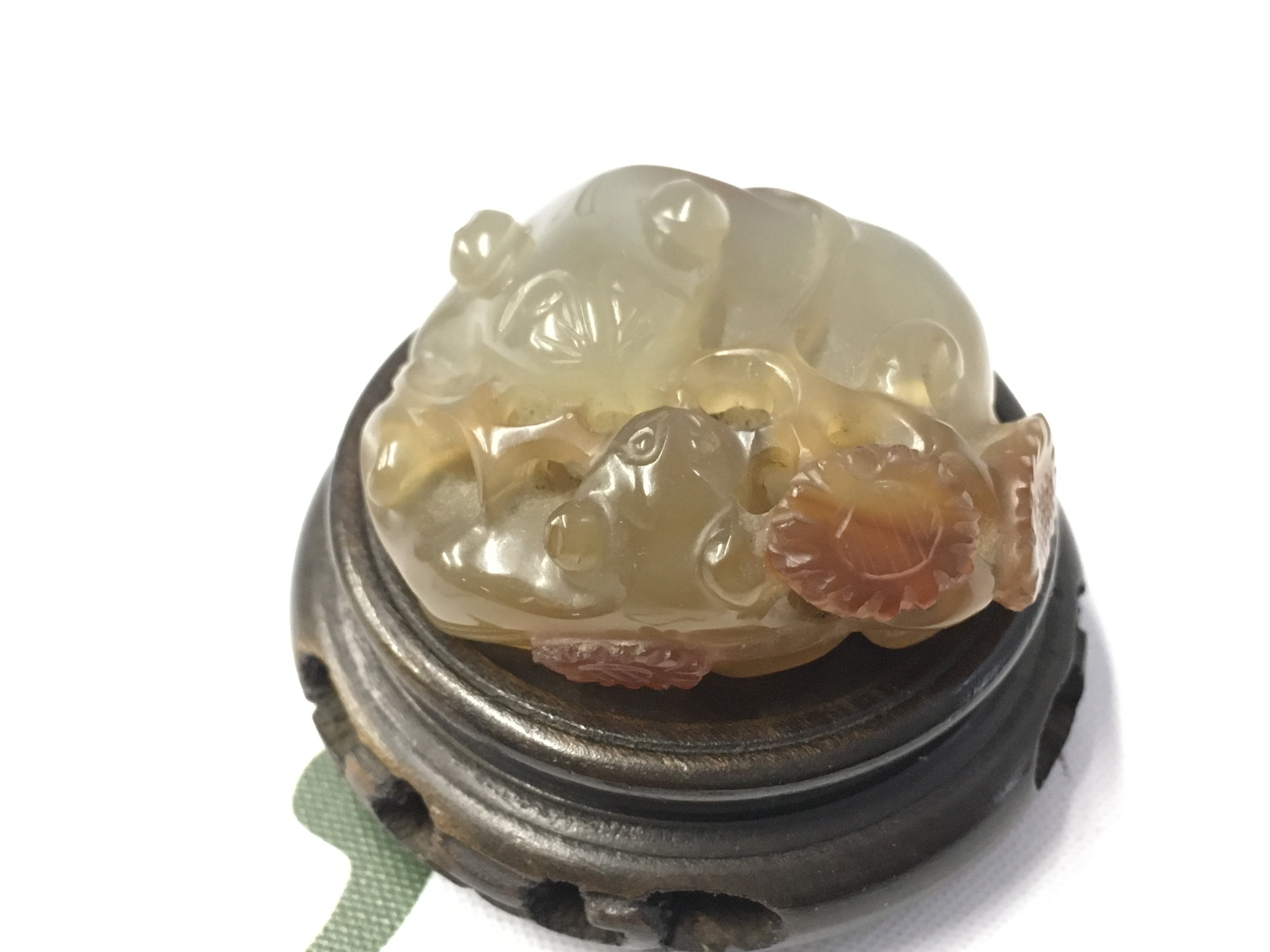 A small Chinese hardstone figure group, two rats with flowers . Postage category A