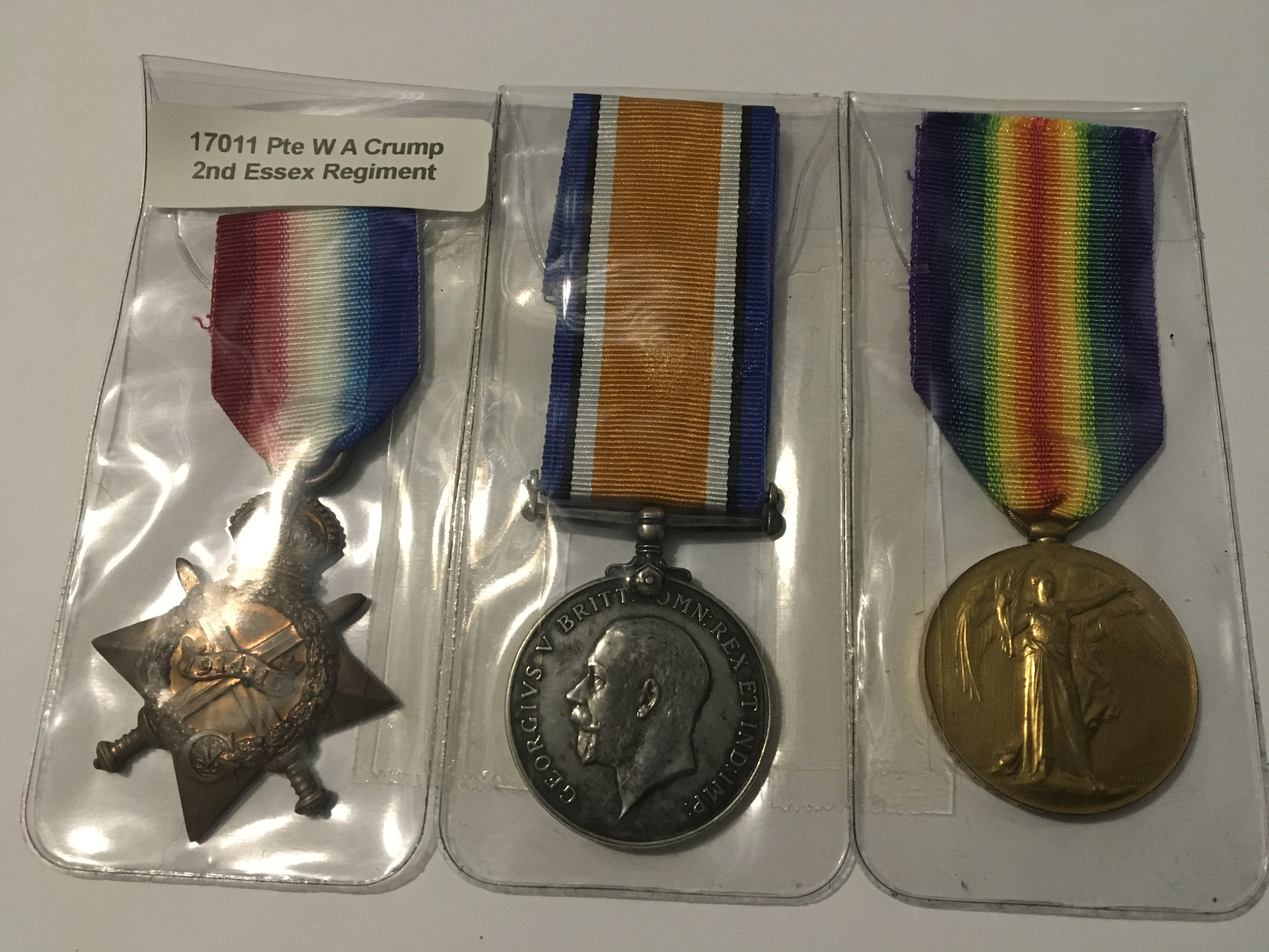 Three I world war medals including 1914/15 star awarded to 17011 PTE W A Crump 2nd Essex Regiment.