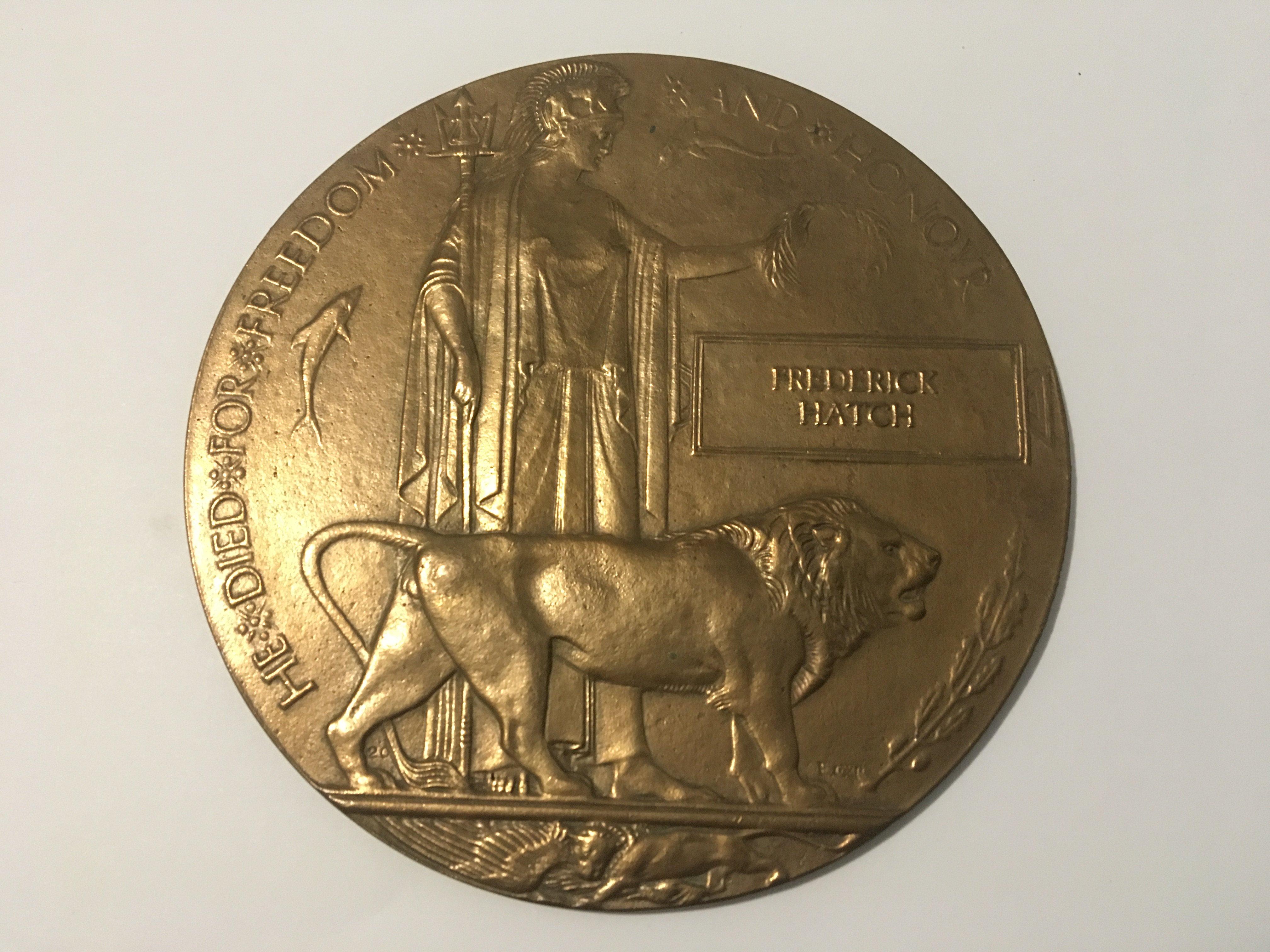 A Bronze I world war memorial plaque Death Penny awarded to Frederick Hatch.