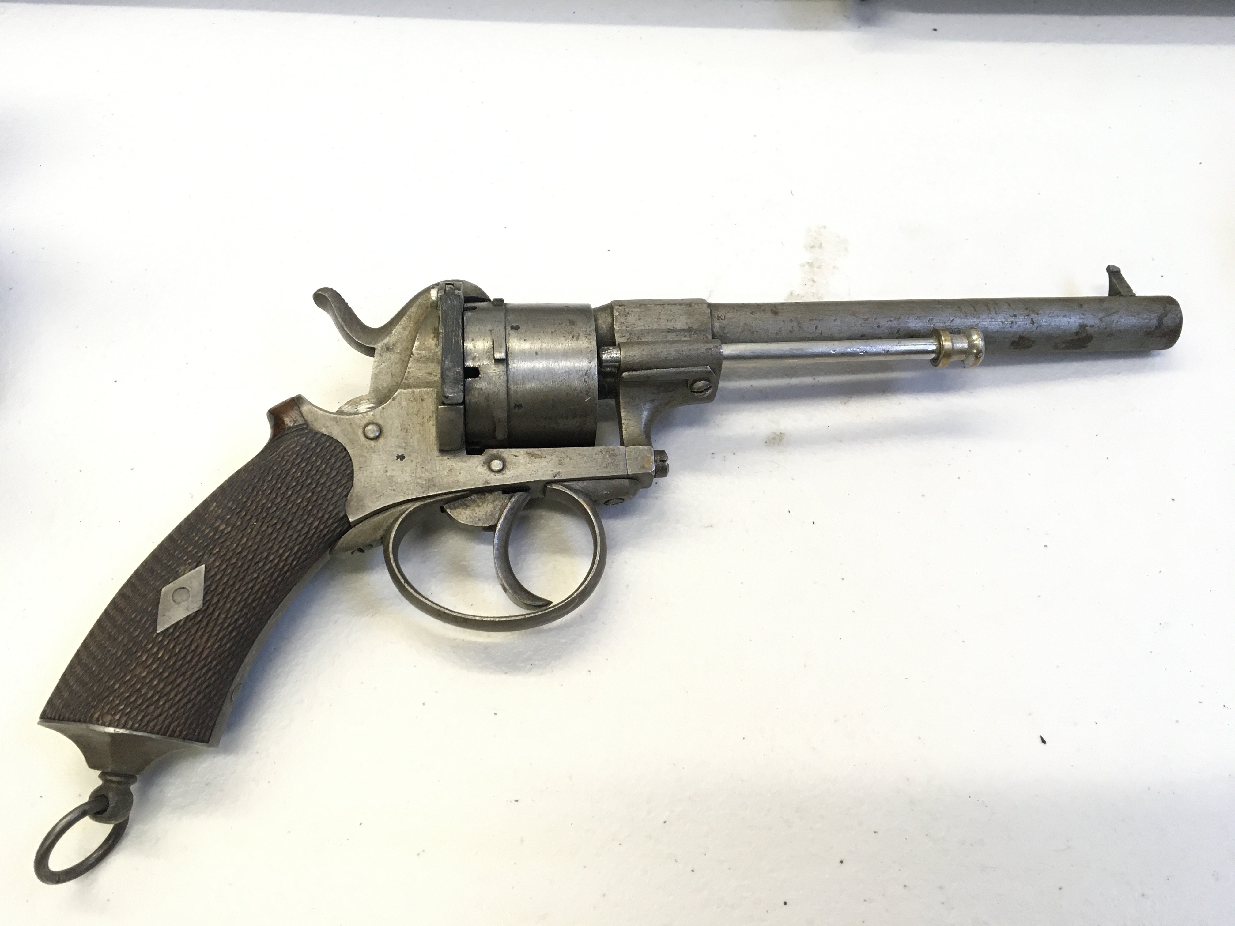 A 19th century pin fire Continental revolver.