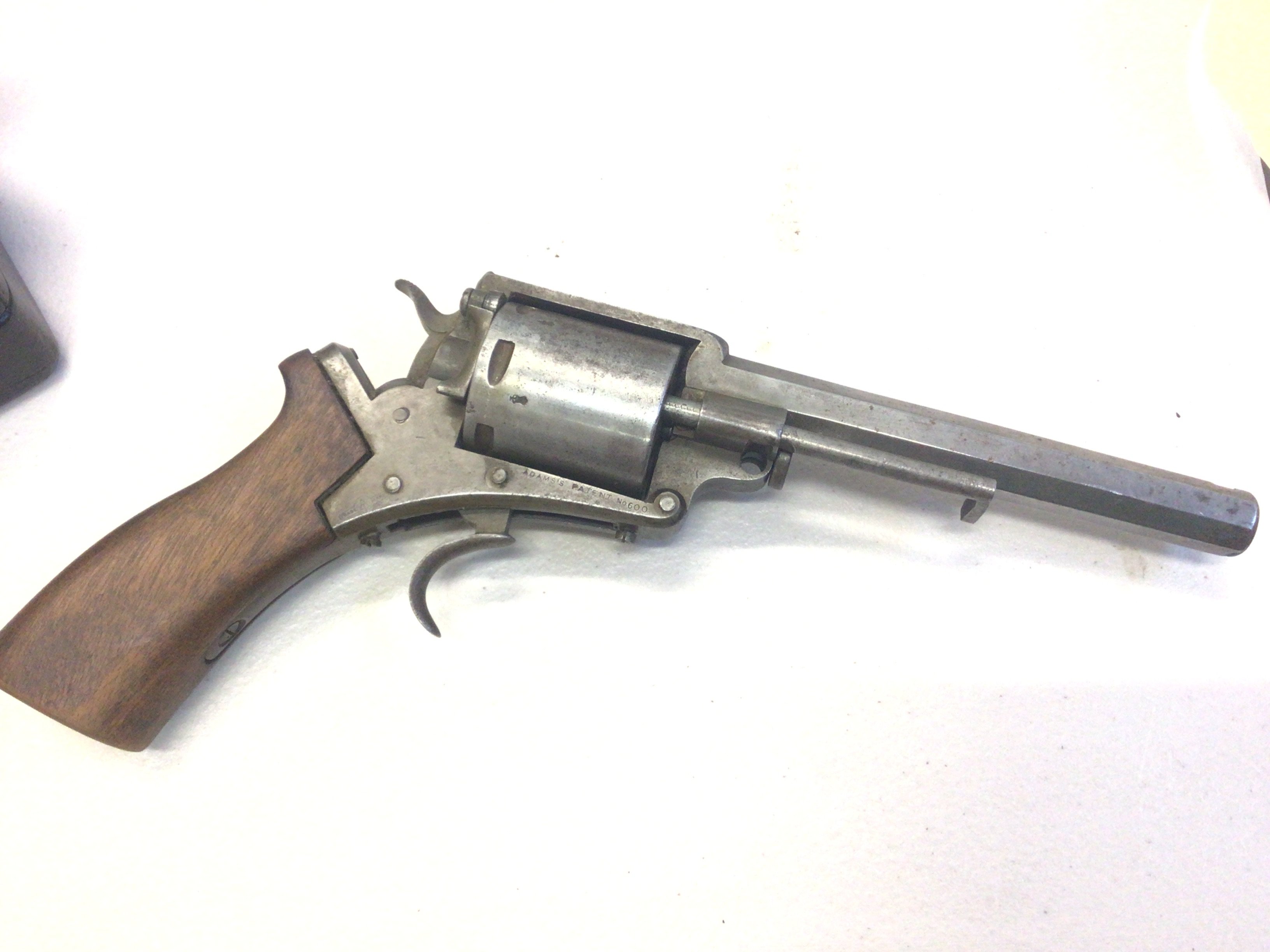 A Rare Antique Zulu war period Adams patent small arms revolver no 600 conforming to the MK III revolver obsolete caliber .450 missing trigger Guard.