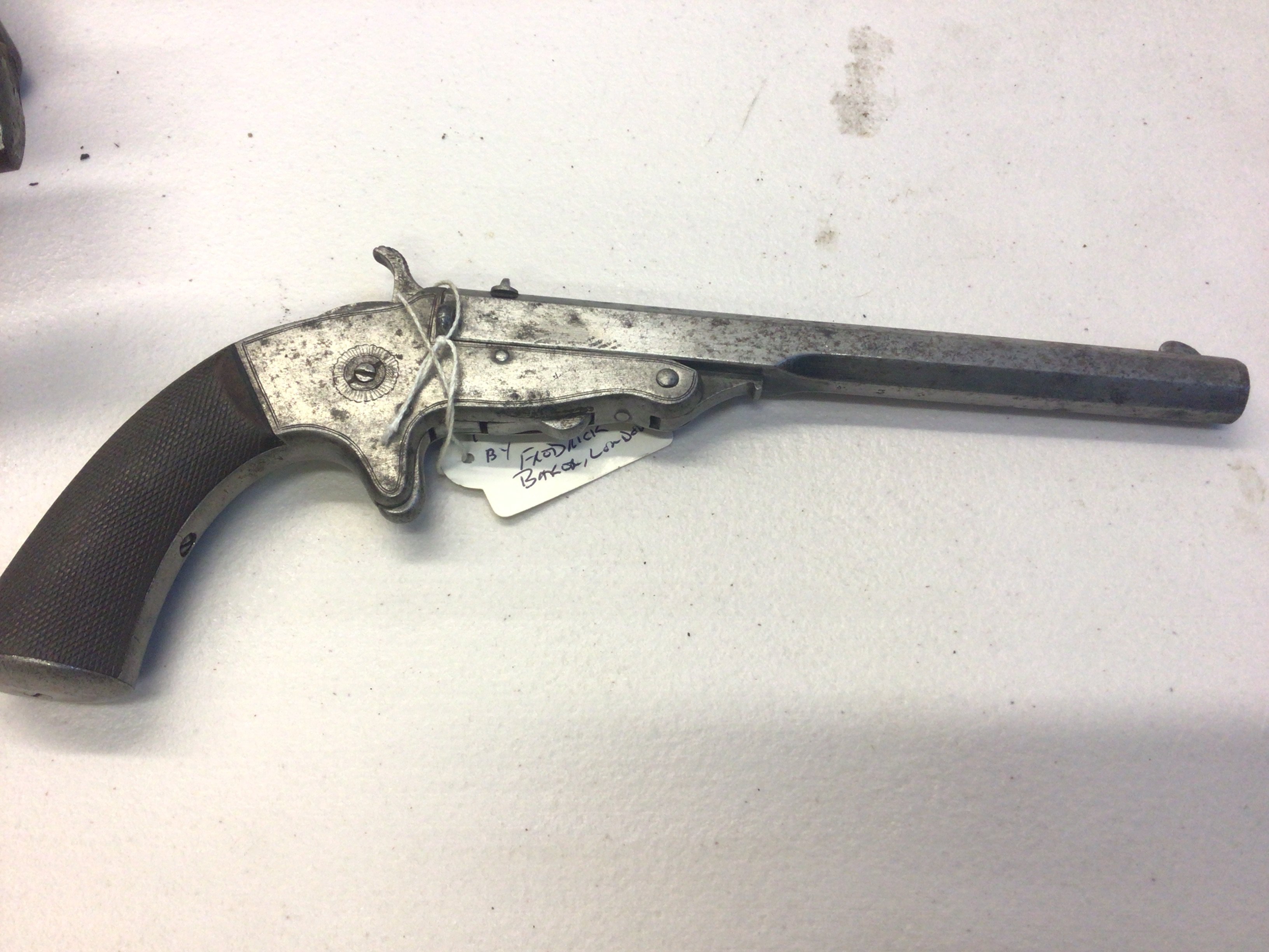 An Antique 1870 Tranter pistol rim fire the steel barrel stamped Frederick T Baker 88 Fleet St London serial number 55334