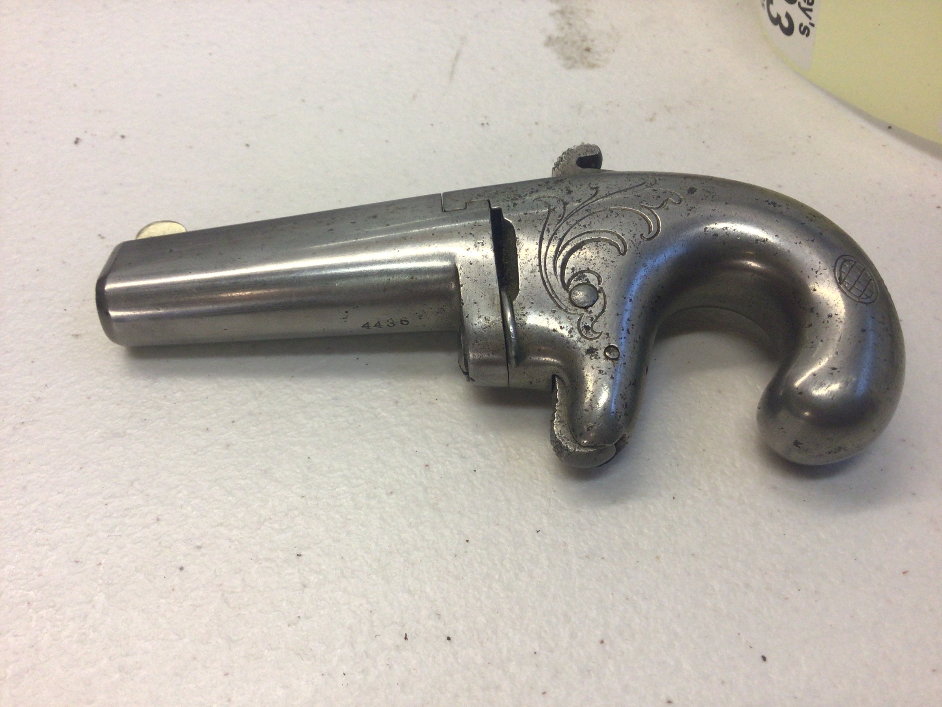 An Antique 19th century Colt No 1 Deringer rimfire pistol circa 1875 produced in relatively low numbers approximately 6500 the pistol with makers marks Colts Hartford CT USA serial number 4436.