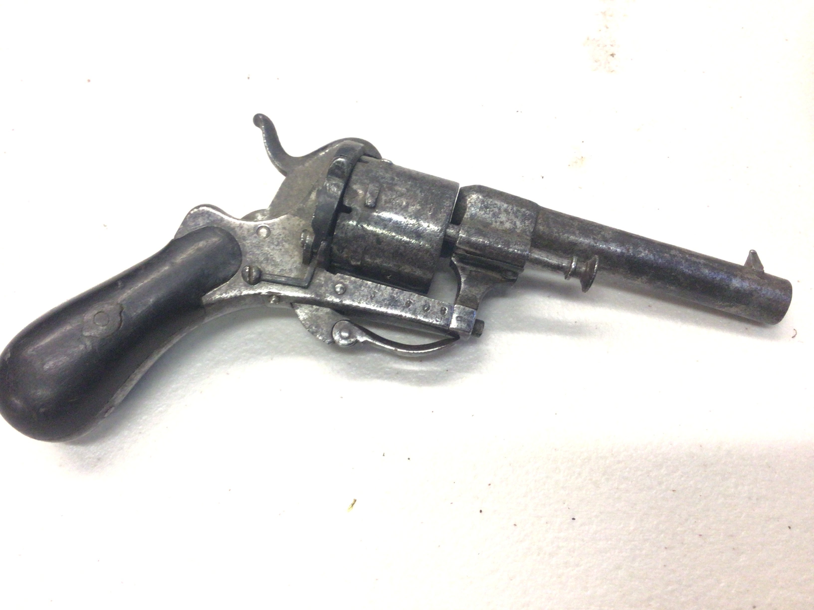 An Antique 19th century Continental rim fire pistol with retracting trigger. With serial number on the action see image.