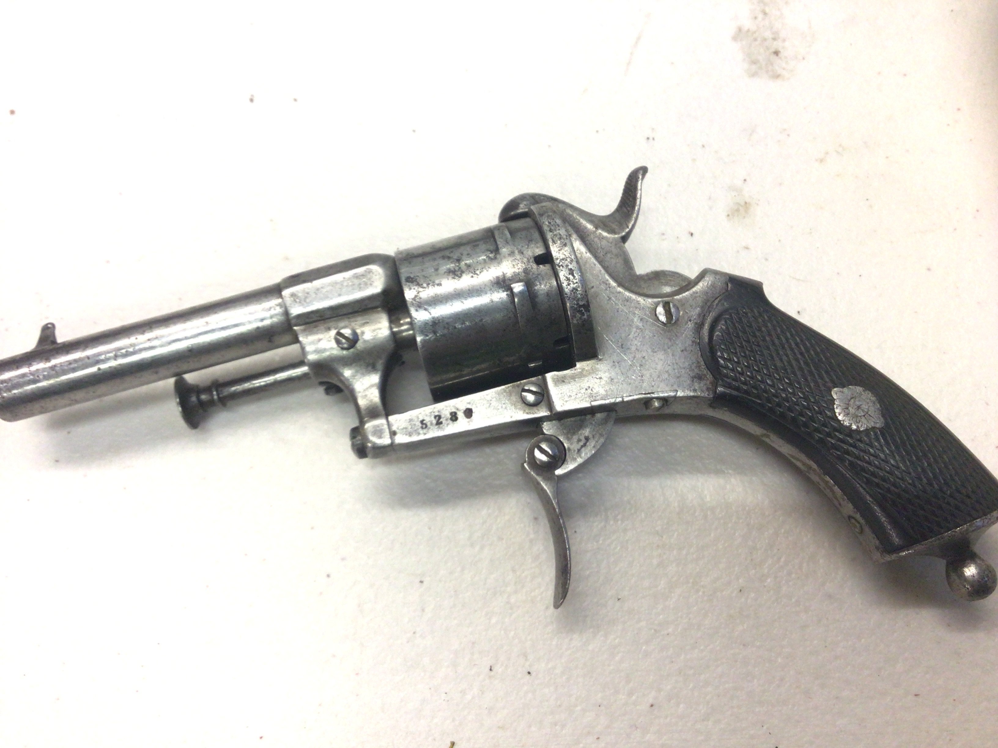 An Antique 19th century rim fire pistol serial number 5286 action non functional.