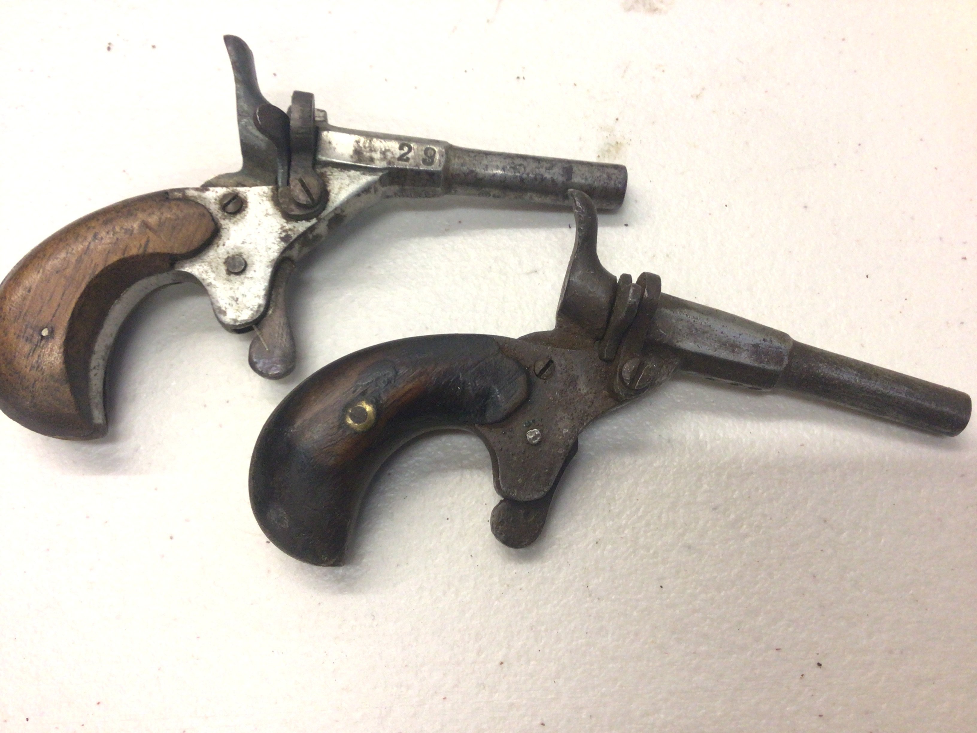 Two Antique Belgium rim fire pocket pistols stamped 29 (2)