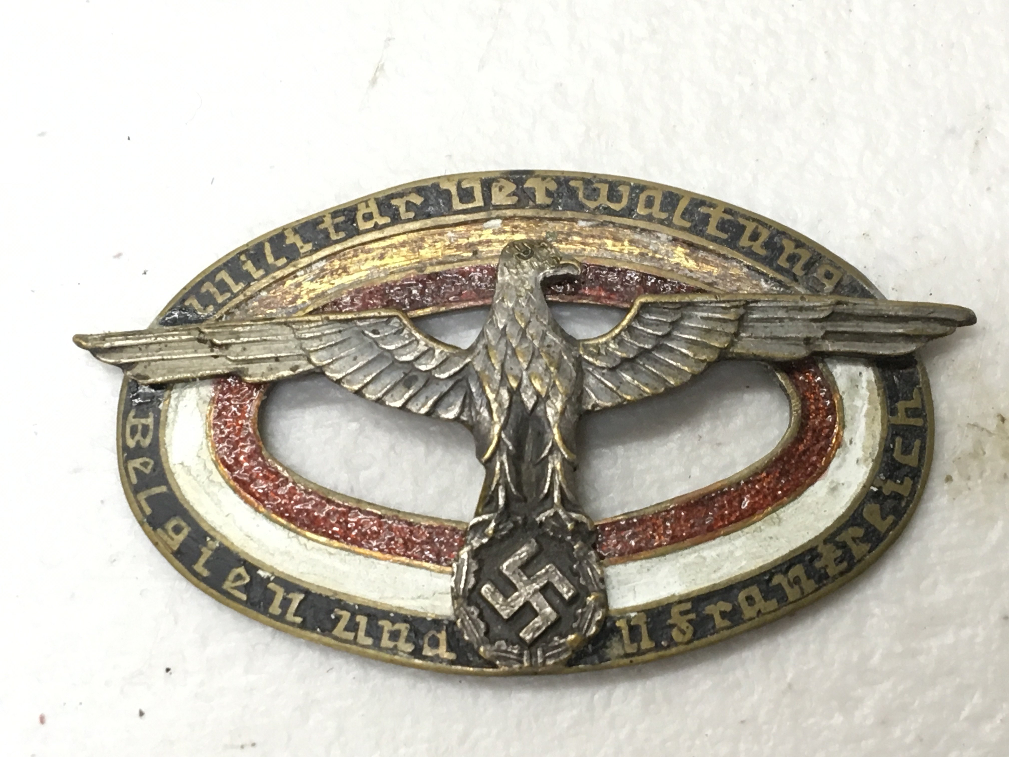 A rare Genuine German Third Reich military badge Administration of Norway. The reverse numbered 4398.