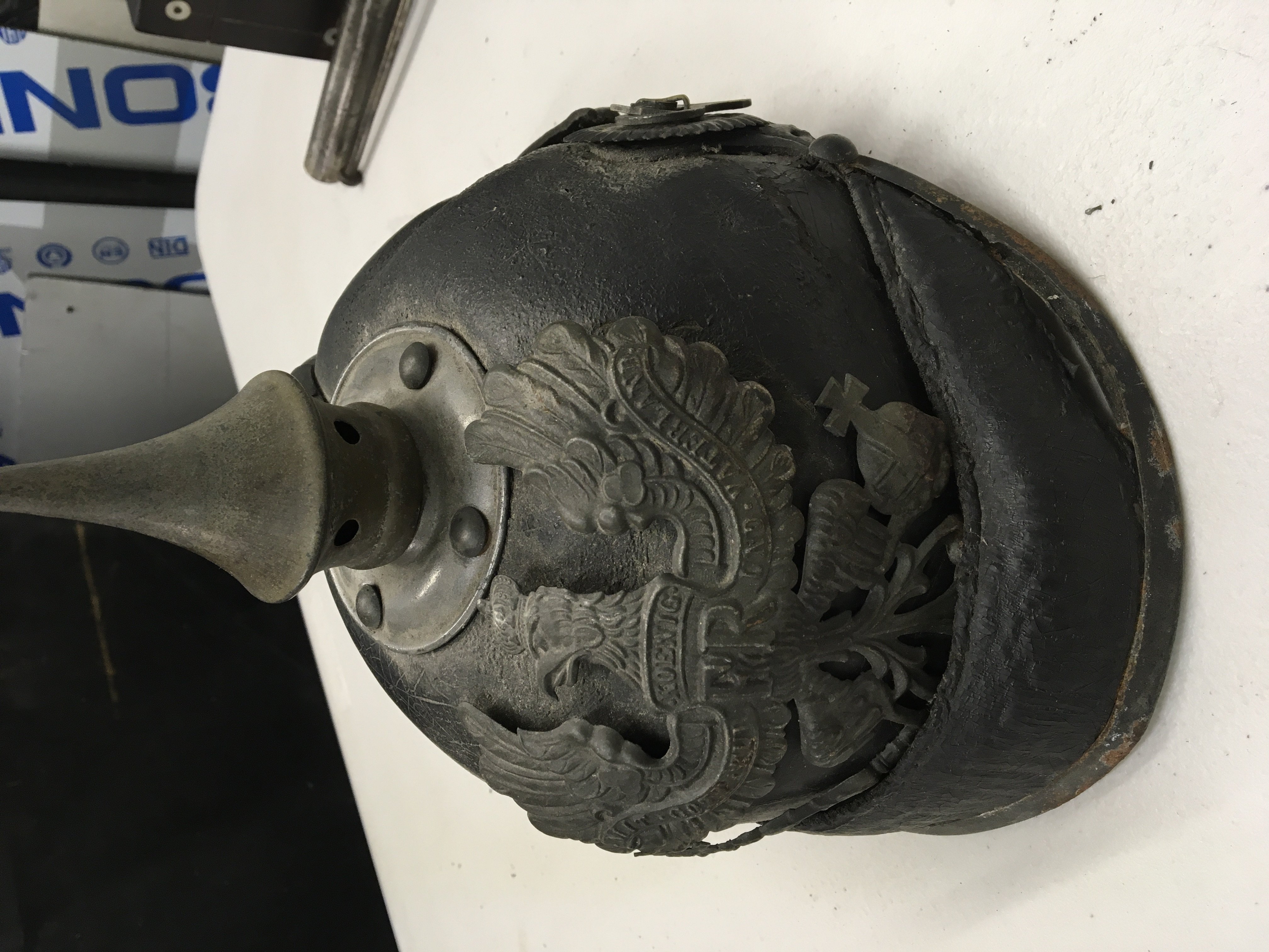 A Genuine battle field find A First World War pickelhelm helmet.