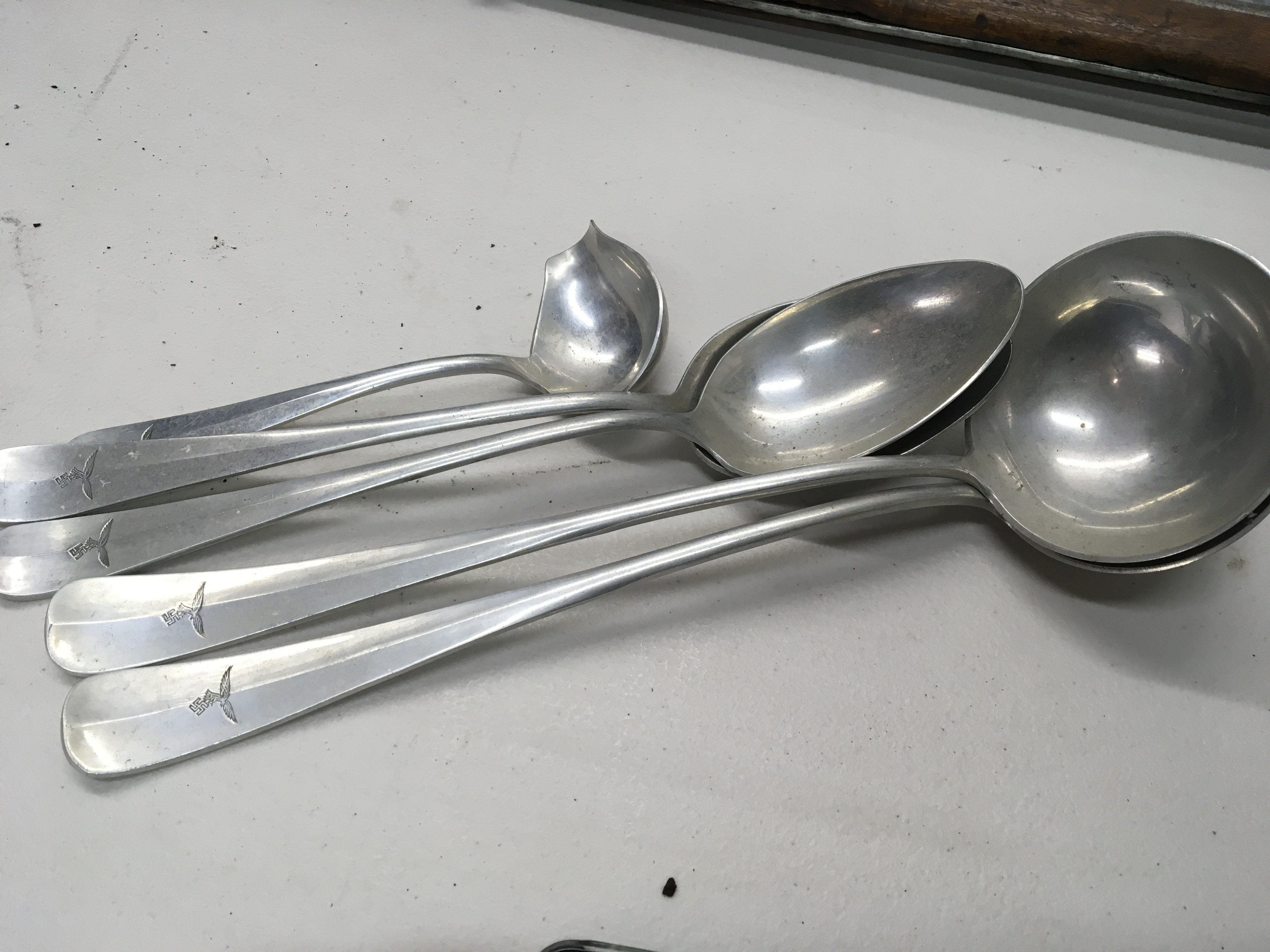 A collection of German Third Reich Luftwaffe catering serving spoons and ladles (5)/