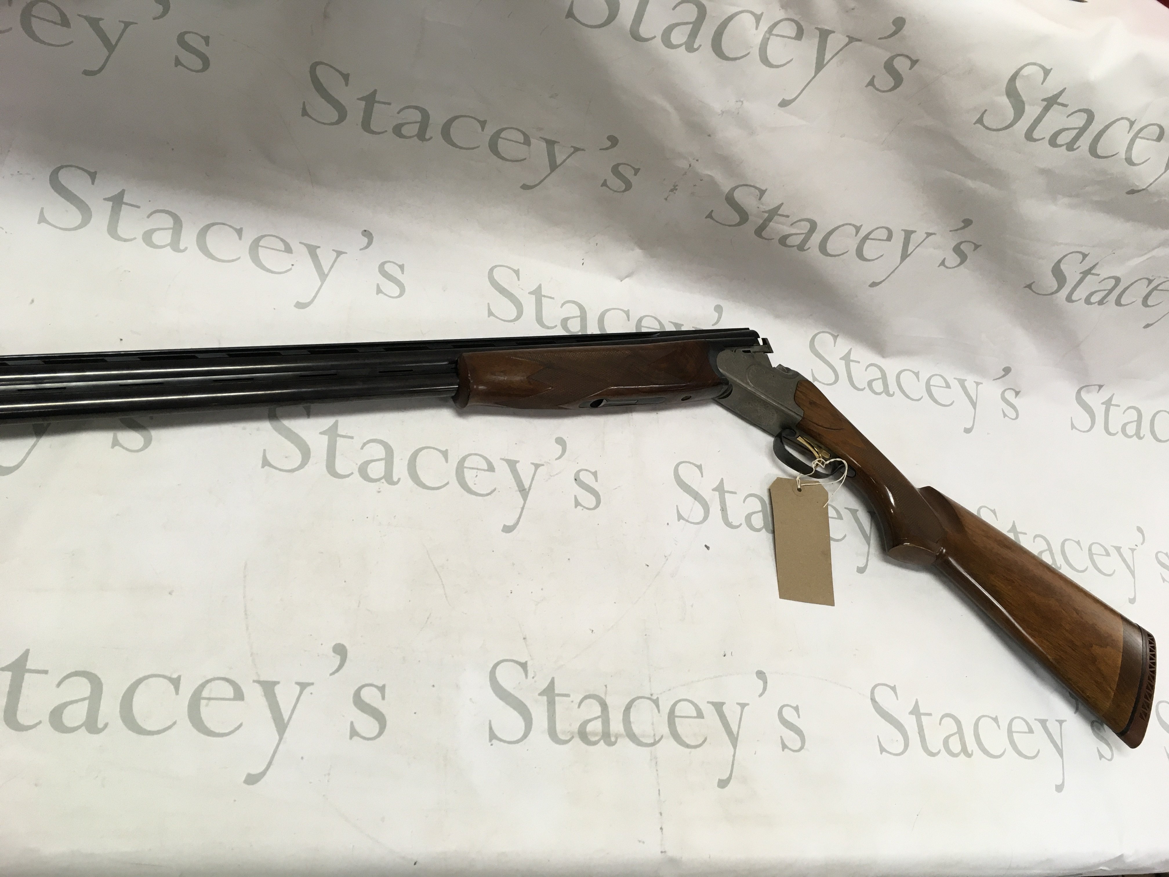 A 12g Lanber over under shotgun. 29.5 inch barrel and 47.5 overall multi chock single triggerband ejector. Serial number 06204-02-12-76 PLEASE NOTE THAT A SHOTGUN LICENSE IS REQUIRED TO PURCHASE THIS ITEM. COLLECTION AND VIEWING BY APPOINTMENT ONLY.