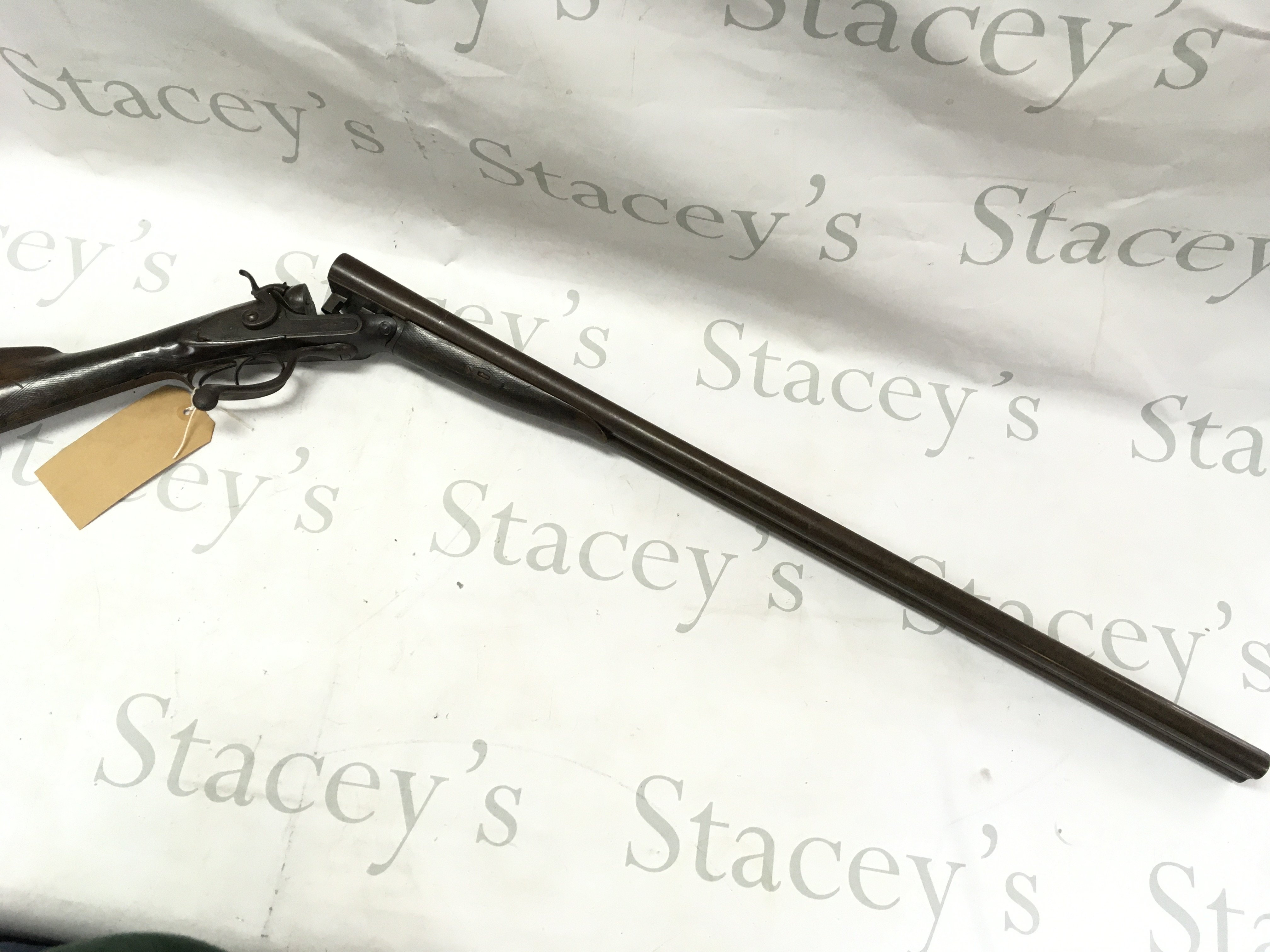 A W Watson and son 12 bore side by side hammer shotgun. 30 inch barrel and 45 inches overall. #11456PLEASE NOTE THAT A SHOTGUN LICENSE IS REQUIRED TO PURCHASE THIS ITEM. VIEWING AND COLLECTING IS BY APPOINTMENT ONLY.