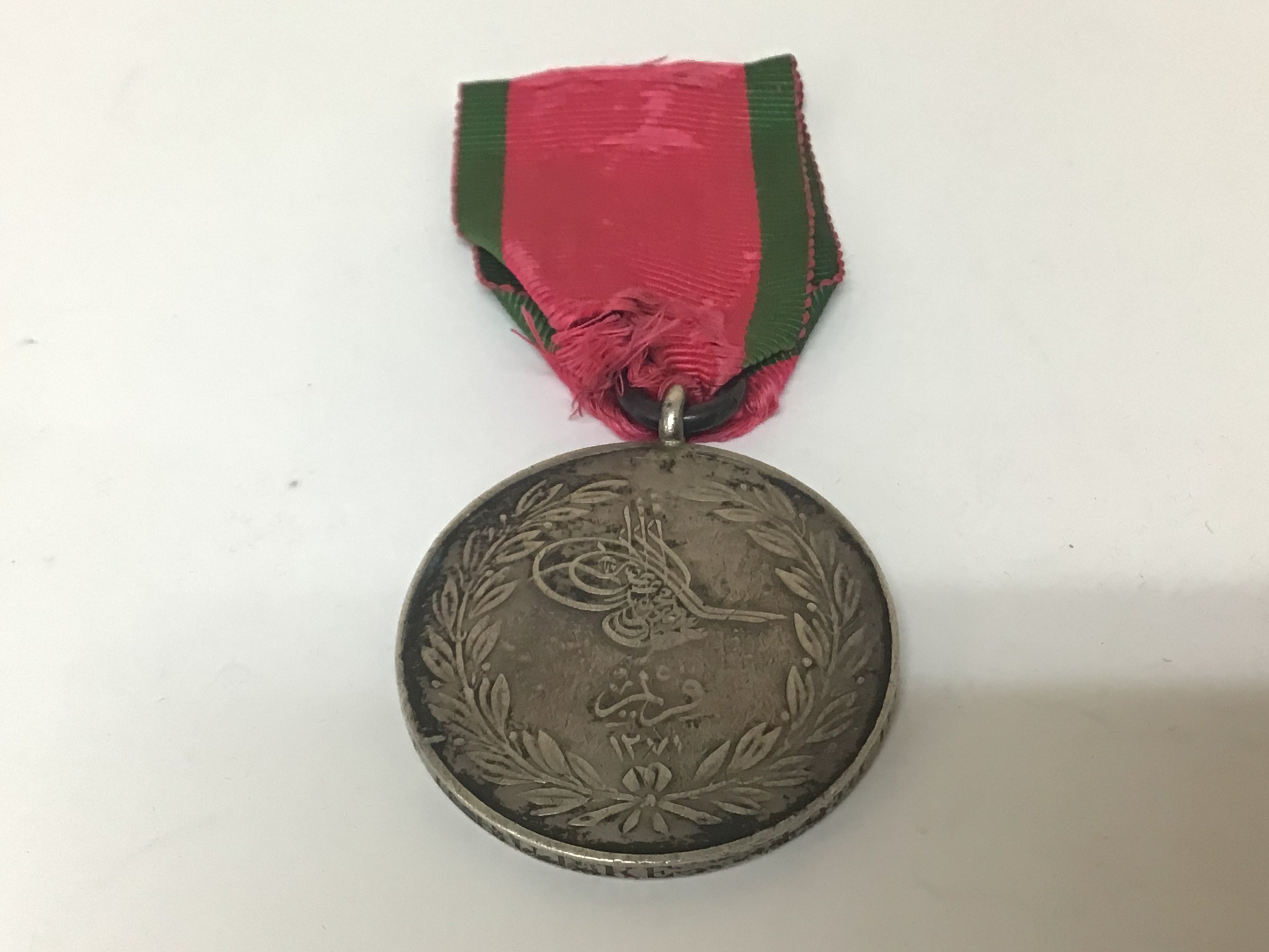 A Crimea 1855 medal awarded to Sergt T H Burke 49th Reg T.