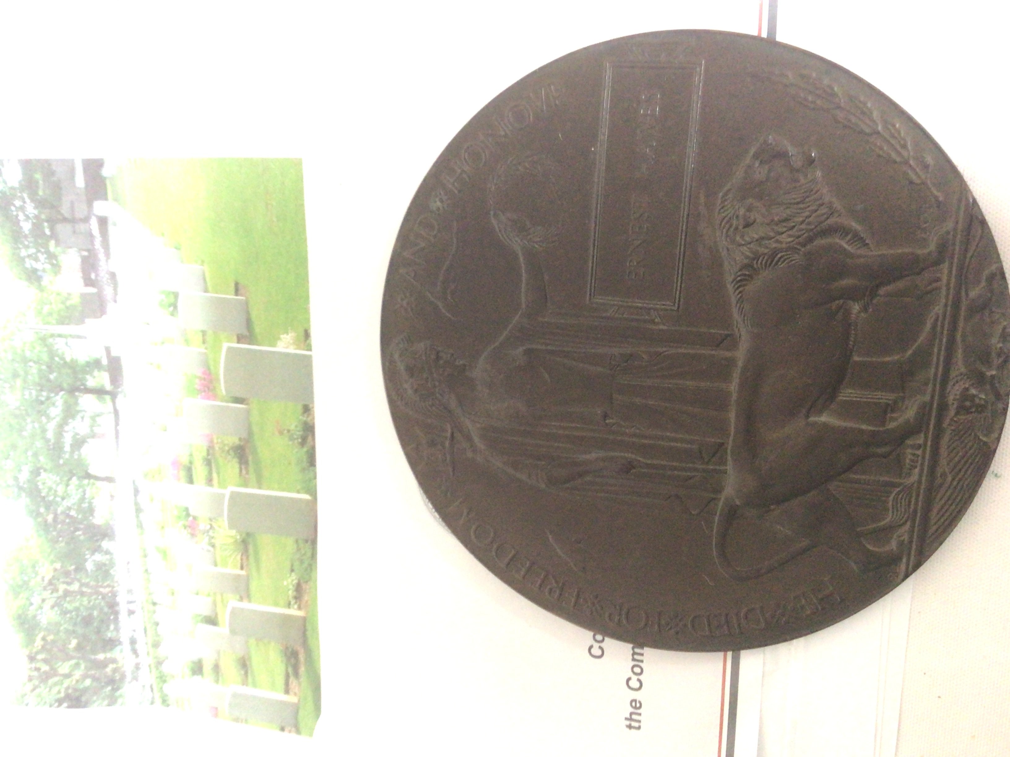 A bronze memorial plaque awarded to Ernest Hawes 90840 Royal Artillery killed on 14th November 1918.