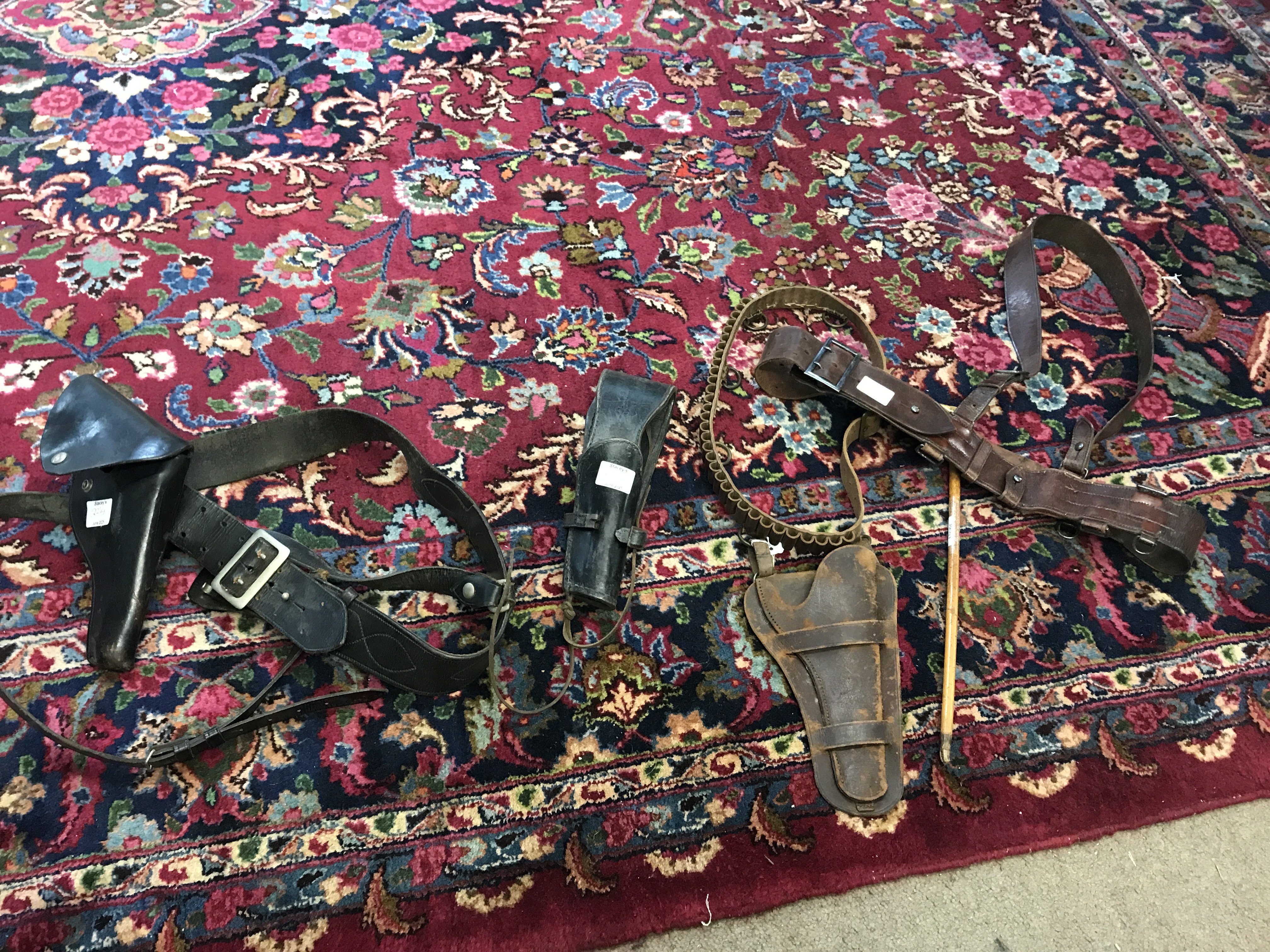 Leather pistol and knife holsters. Postage category B