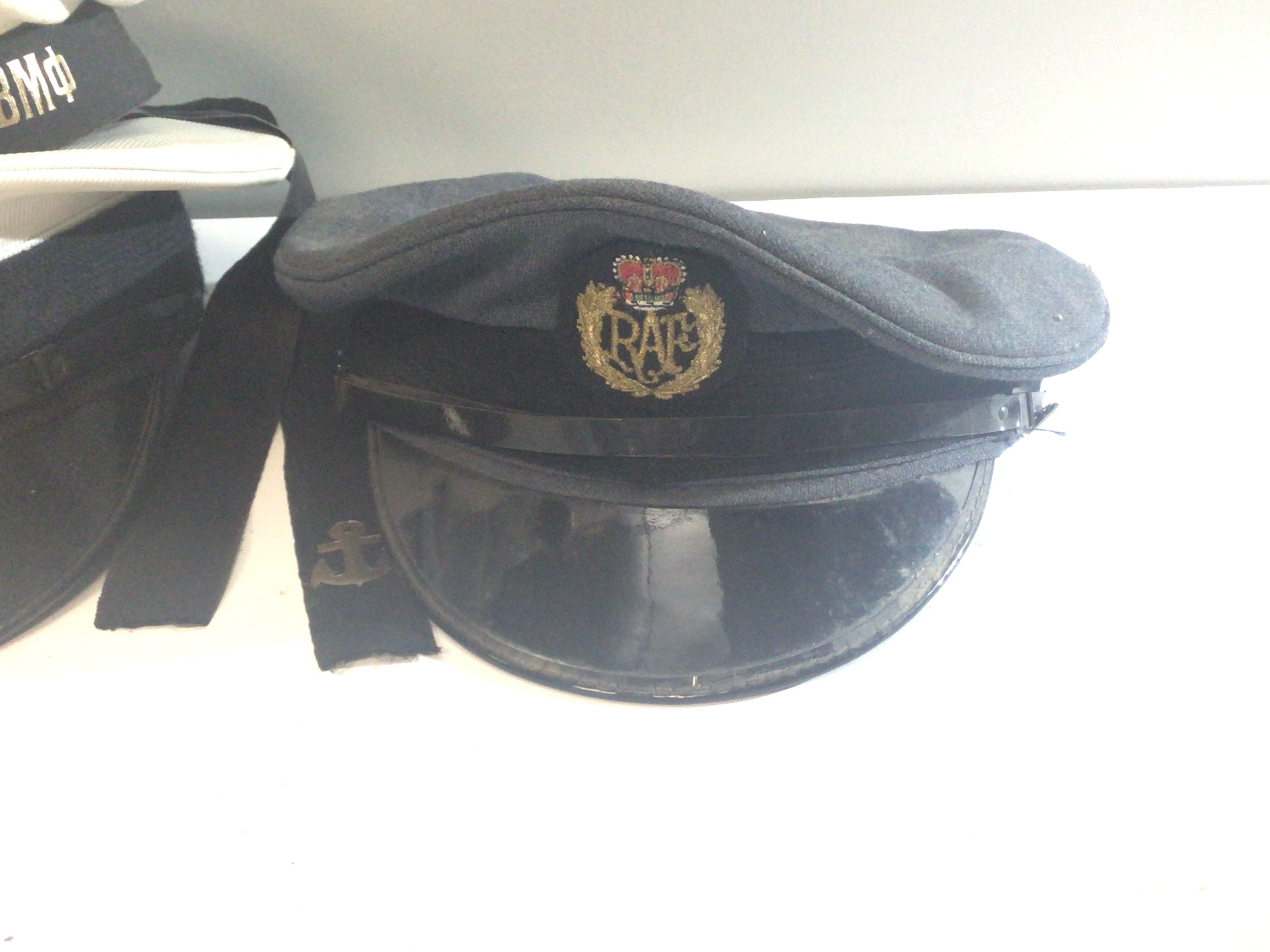 A collection of cloth Caps. HMS Wildfire RAF German Police Russian Navy (5)