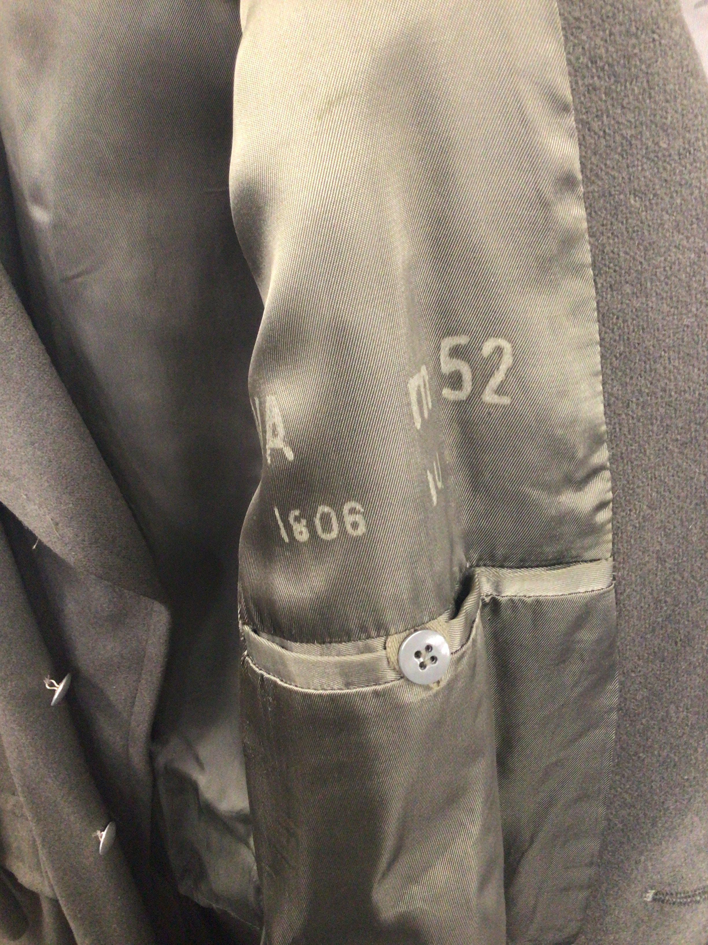 A German Third Reich officers overcoat M52 badged with epaulets.