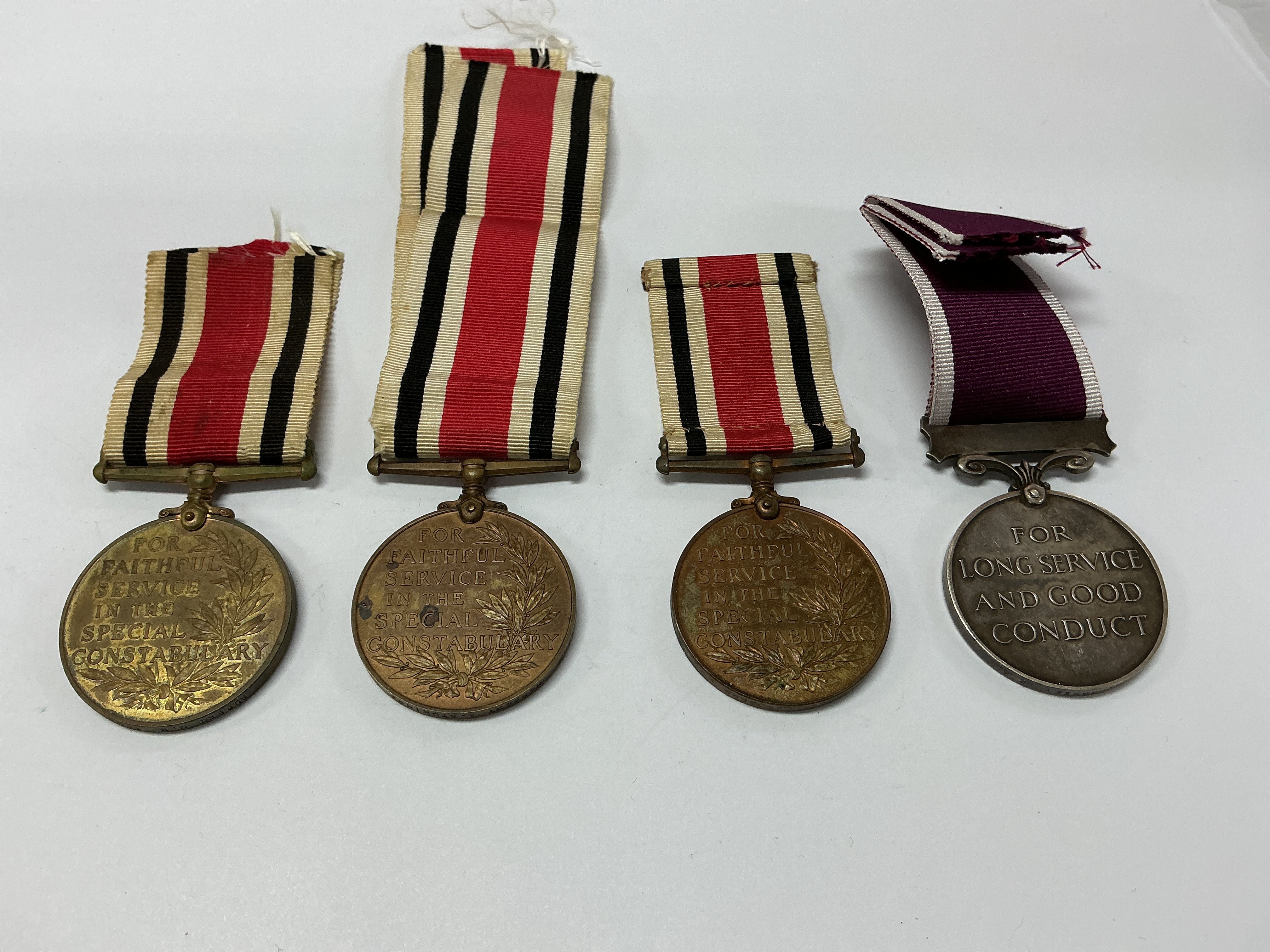 Group of four WW1 medals. RUPERT. M. M. POLLOCK, for faithful services in the special constabulary (1). HERBERT A. STUKINS, for faithful service in the special constabulary (2). CHARLES C. ROGERS, for faithful service in the special constabulary (3). 1407801 BMBR. W. J. RAMSEY R. A., for long service and good conduct (4).