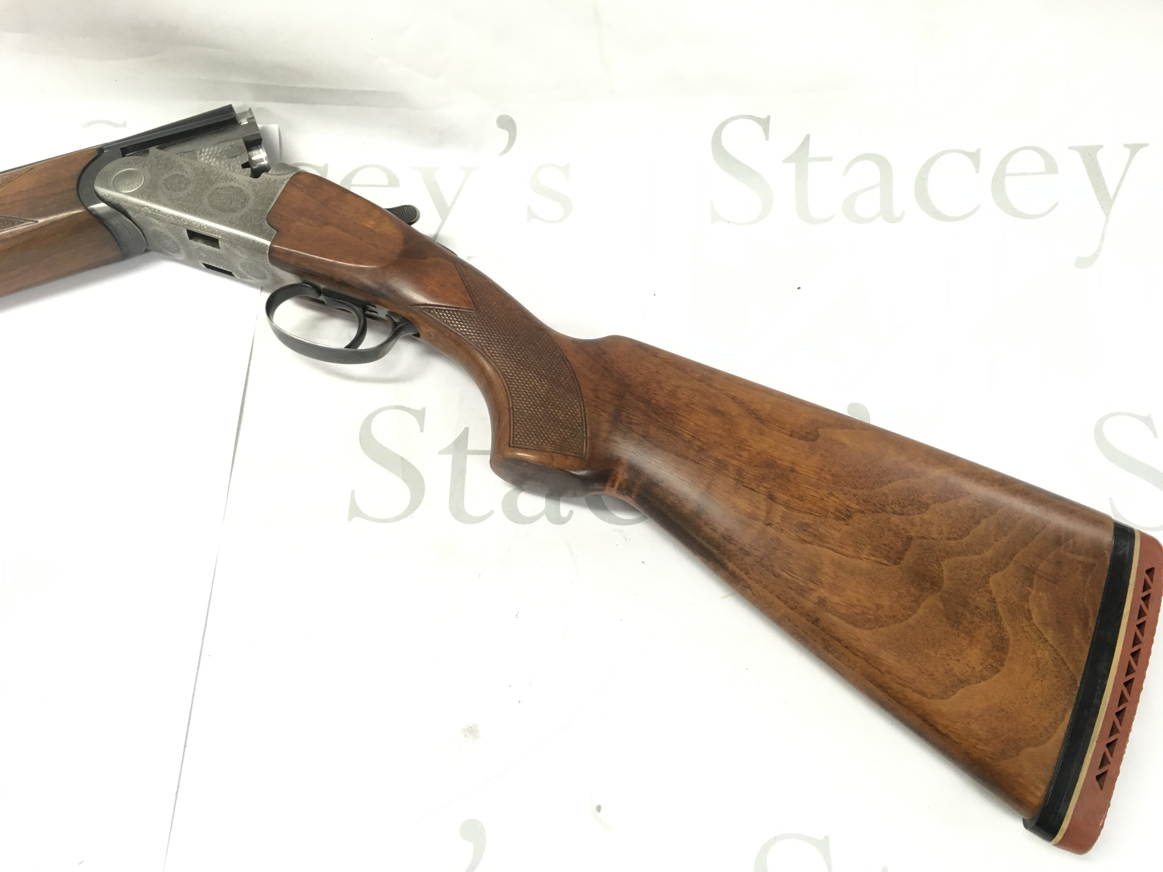 A 12g Rizzini over under shotgun. Single trigger. Approximately 27 inch barrels. Number 3723 PLEASE NOTE THAT A SHOTGUN LICENSE IS REQUIRED TO PURCHASE THIS ITEM. COLLECTION AND VIEWING BY APPOINTMENT ONLY.