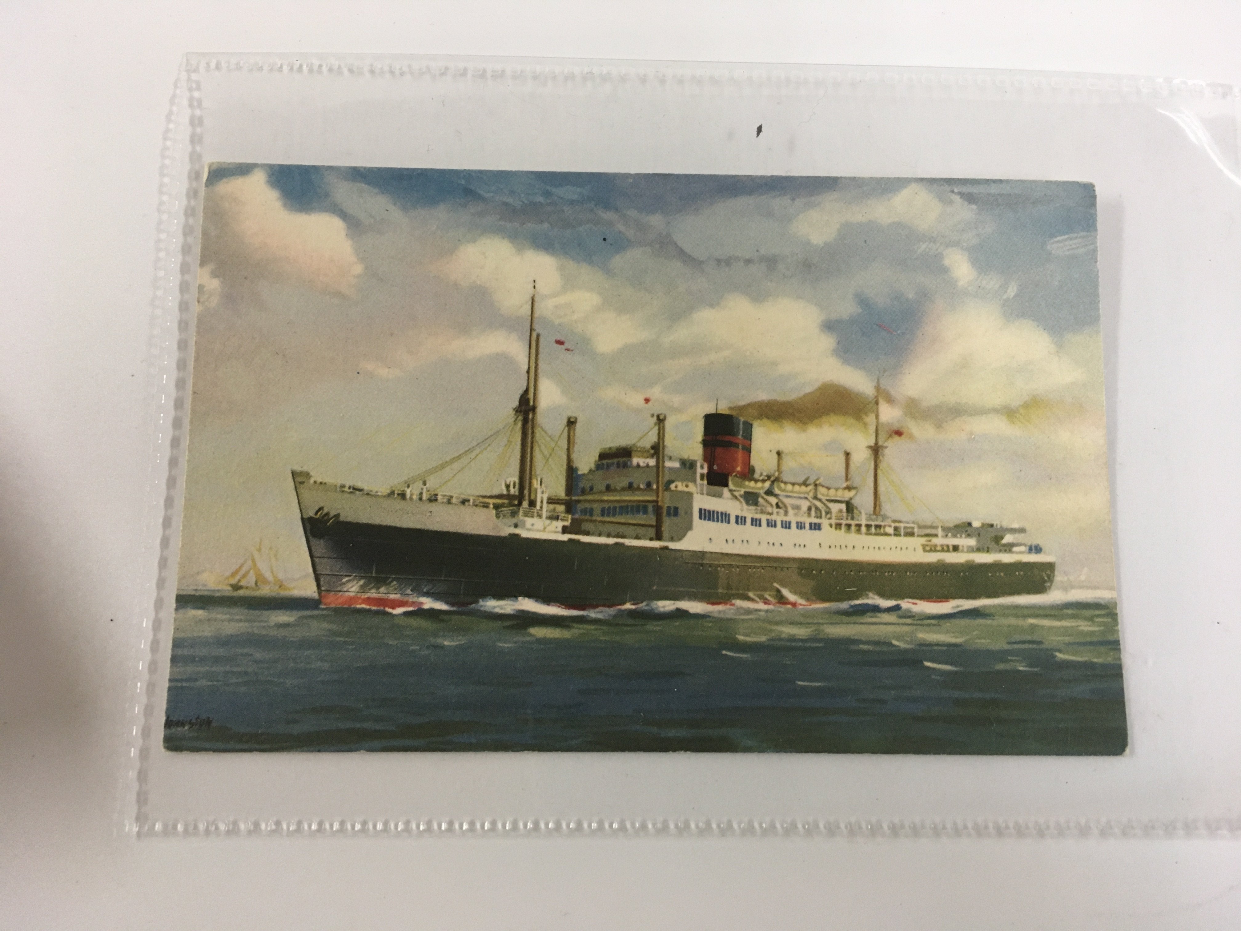 A collection of Furness line items consisting of an original bird of paradise design cup from the Furness line shipping company, as used in service Furness line tea spoon, small side plate from the Furness Bermuda line shipping company, very old postcard from the RMS Newfoundland from the Furness warren line, early set of old playing cards from the Furness shipping company and a pair of very old matchbook covers from the Furness lines shipping company