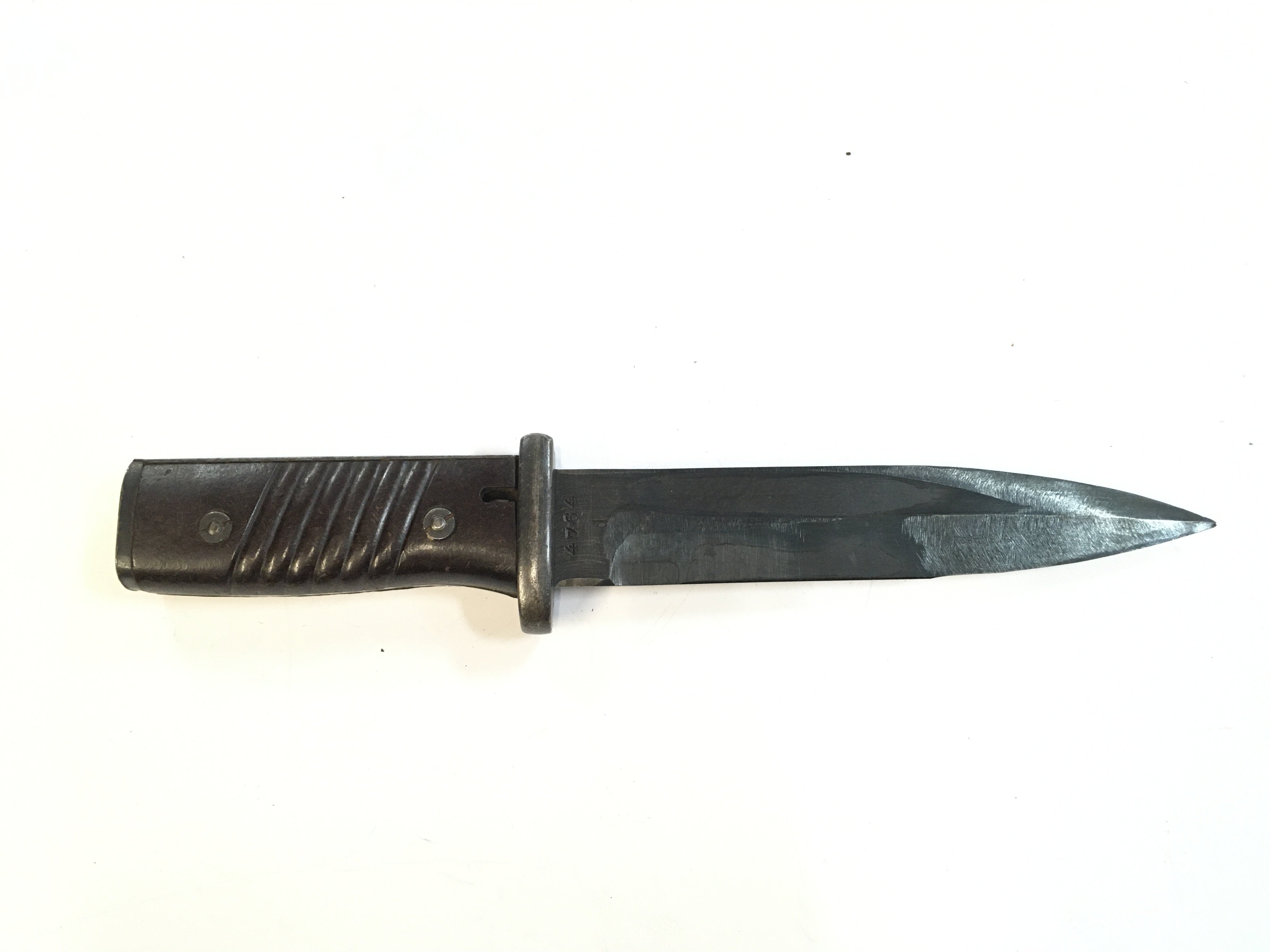 A WW2 German Third Reich combat knife made from a K98 bayonet. Blade 14cm , Total length 25cm approximately . This lot cannot be posted