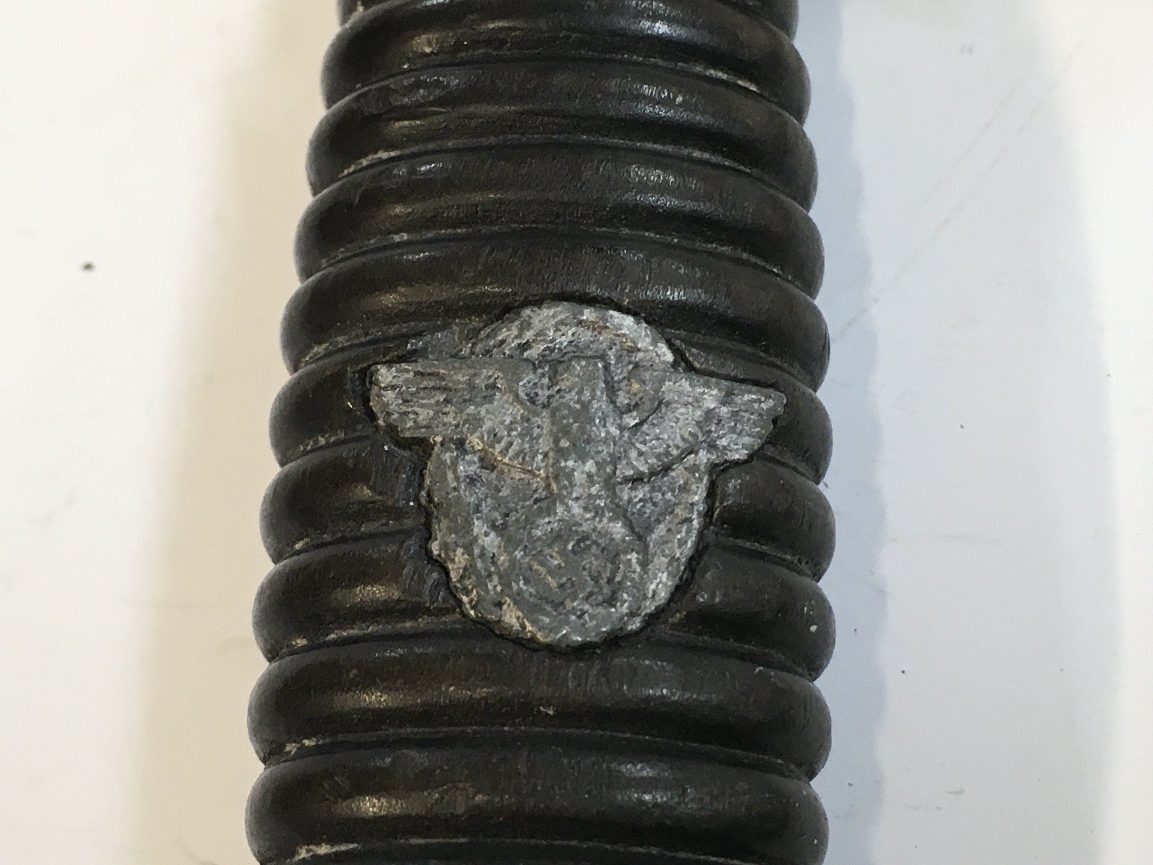 The Grip and knucklebow for a third Reich police subordinates sword with grey metal grip eagle. Postage category A