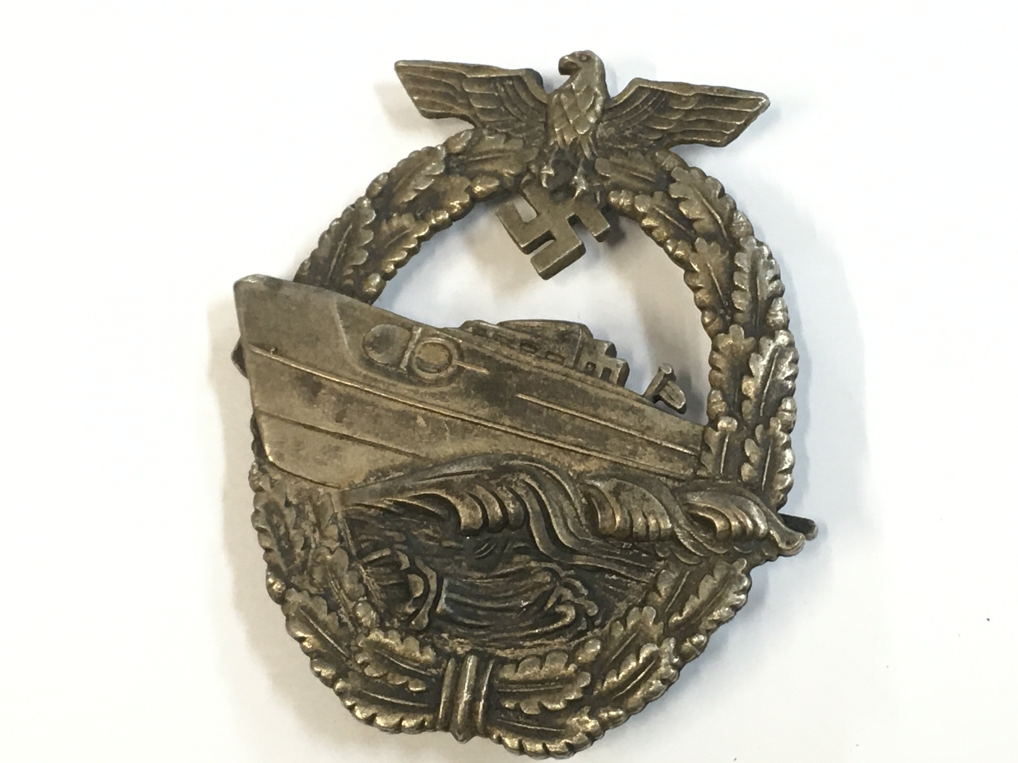 A Third Reich Rare E Boat badge. Postage category A
