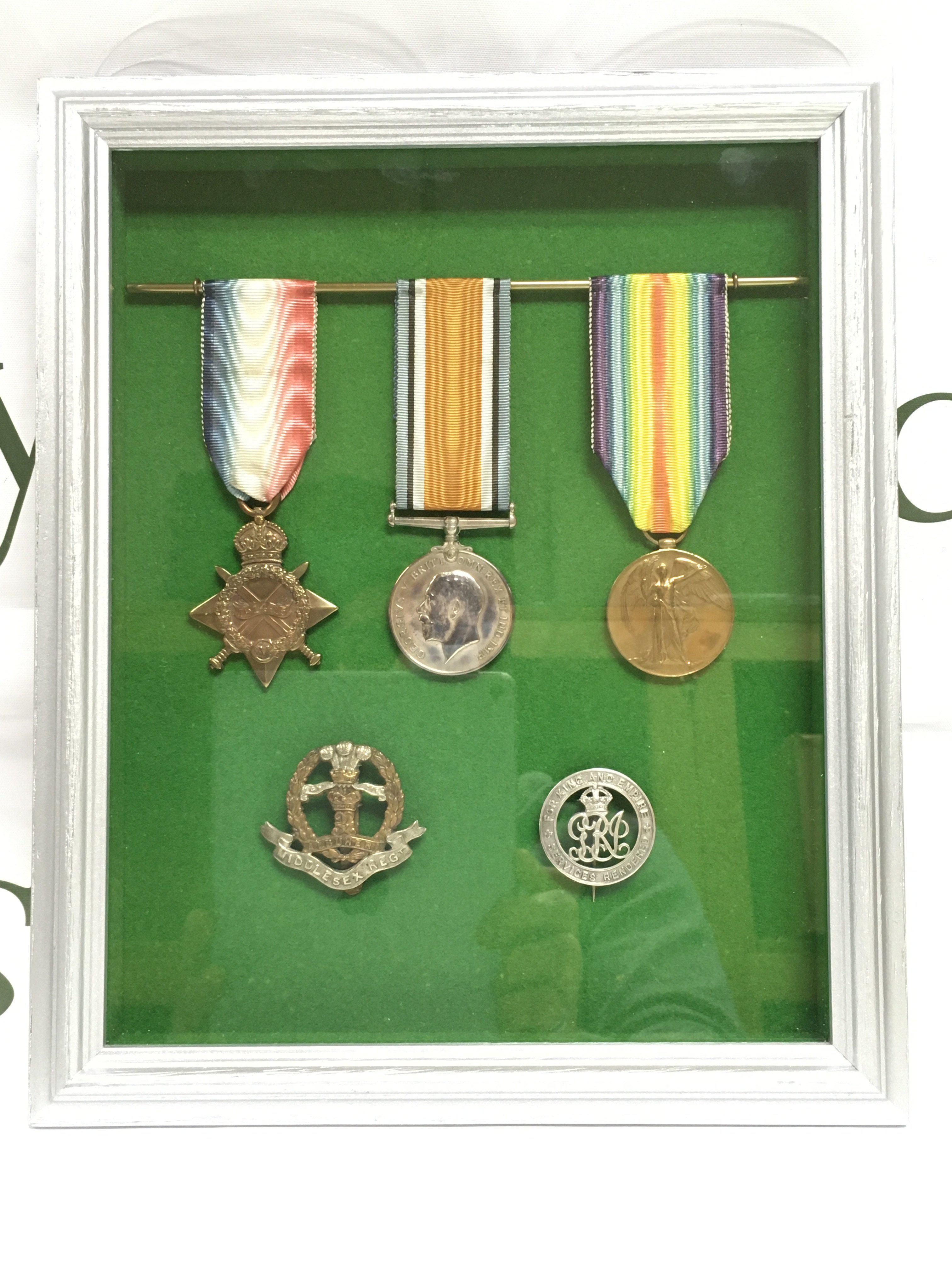 A framed collection of medals awarded to Robert Storey, Middlesex regiment. Shipping category D.