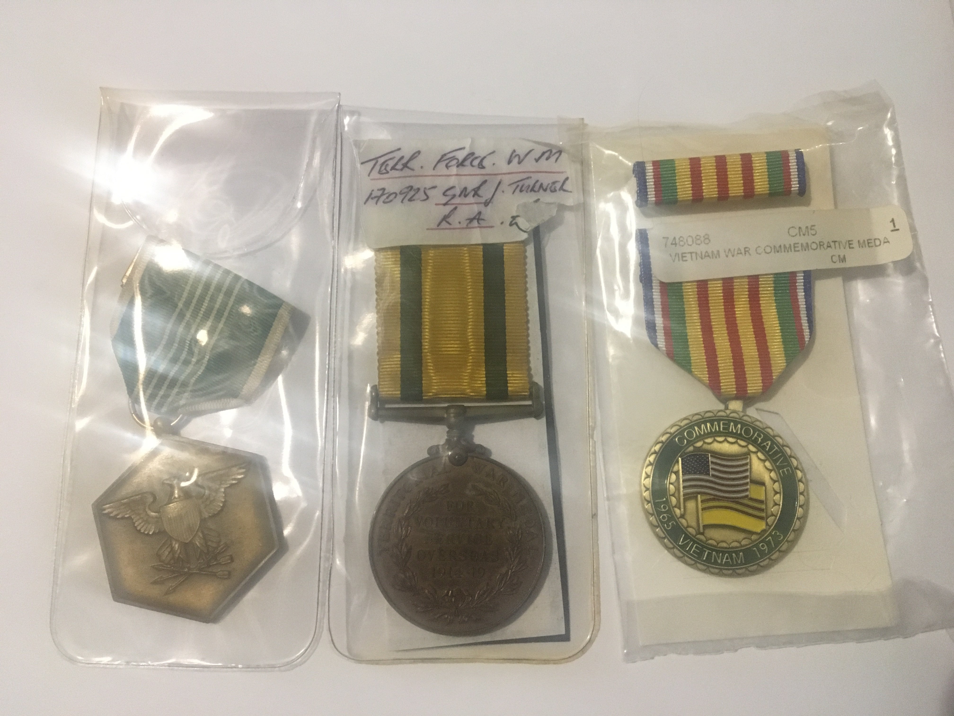 An American Commendation medal Military 1961-1963 Vietnam commemorative medal and a Territorial medal 1914-19 awarded to 170925 Gnr Turner RA. (3)