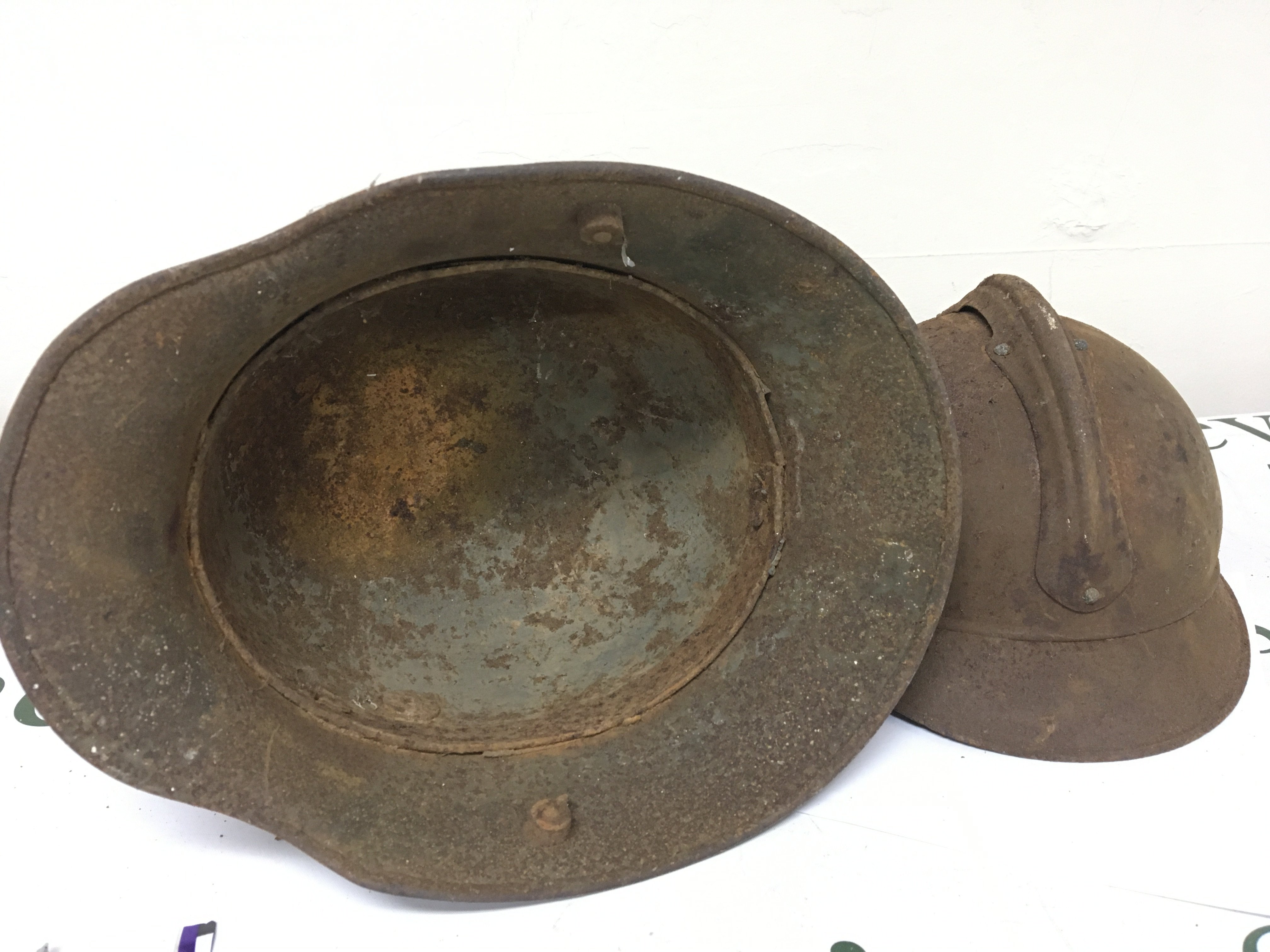 Battle Field Relic finds I world war A German steel M16 pattern helmet a French Helmet and two shell cases 1917. 