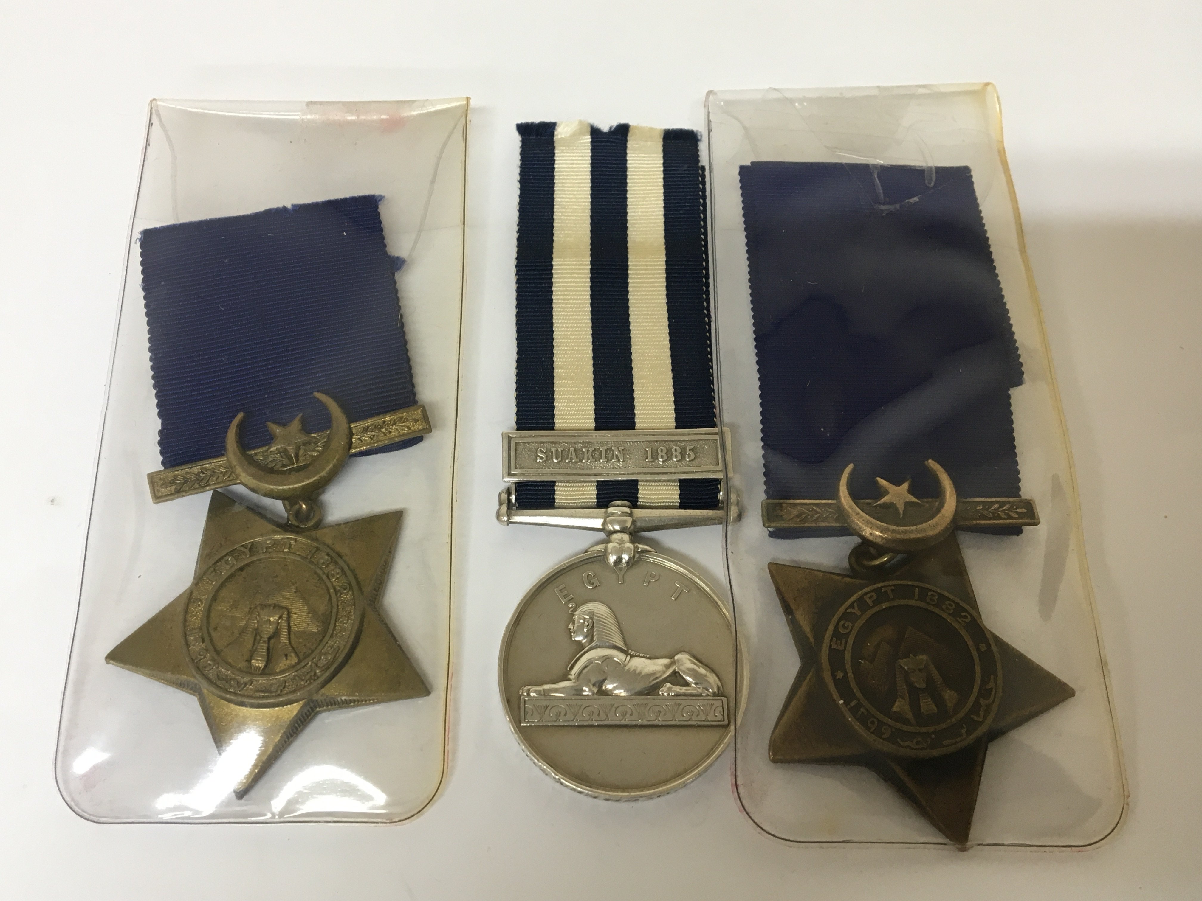 A Victorian Egyptian Medal with Campaign bar Suakin 1885 awarded to 2553.3Rd CL S SG W Green 7th Co C & TC. With two Other Egyptian medals (3)
