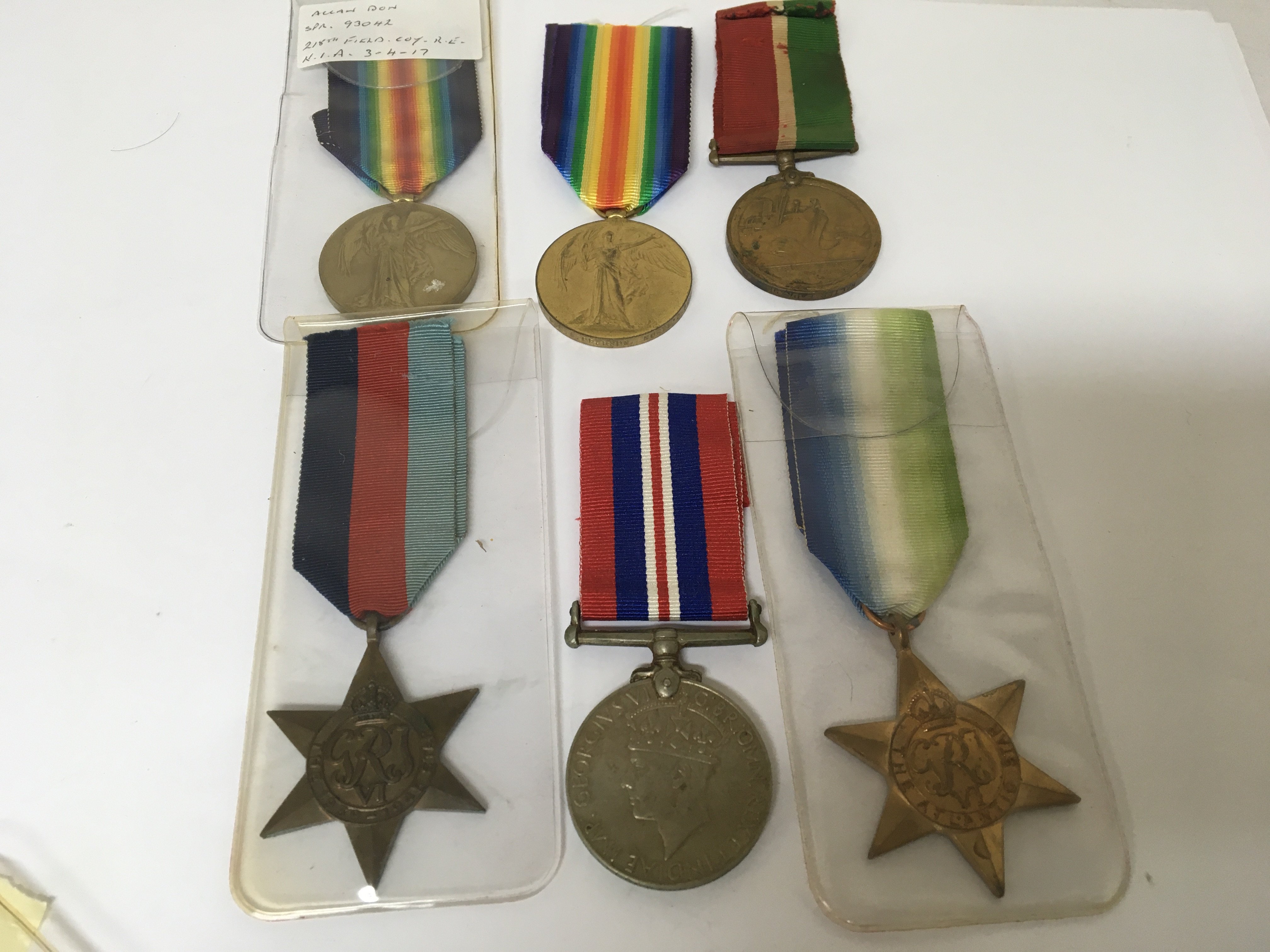 A collection of medals I world war medals including a 1914-1918 Mercantile medal awarded to Walter E Price 93042 Allan Don 218 Field RE killed in action 3/4/17 also 84325 PTE I Pearson North D Fus. A II world war Medals Atlantic Star 1939-45 star and Victory medal with inscribed edge 5057 RFN Lalrahadur Rana 5 GRC.