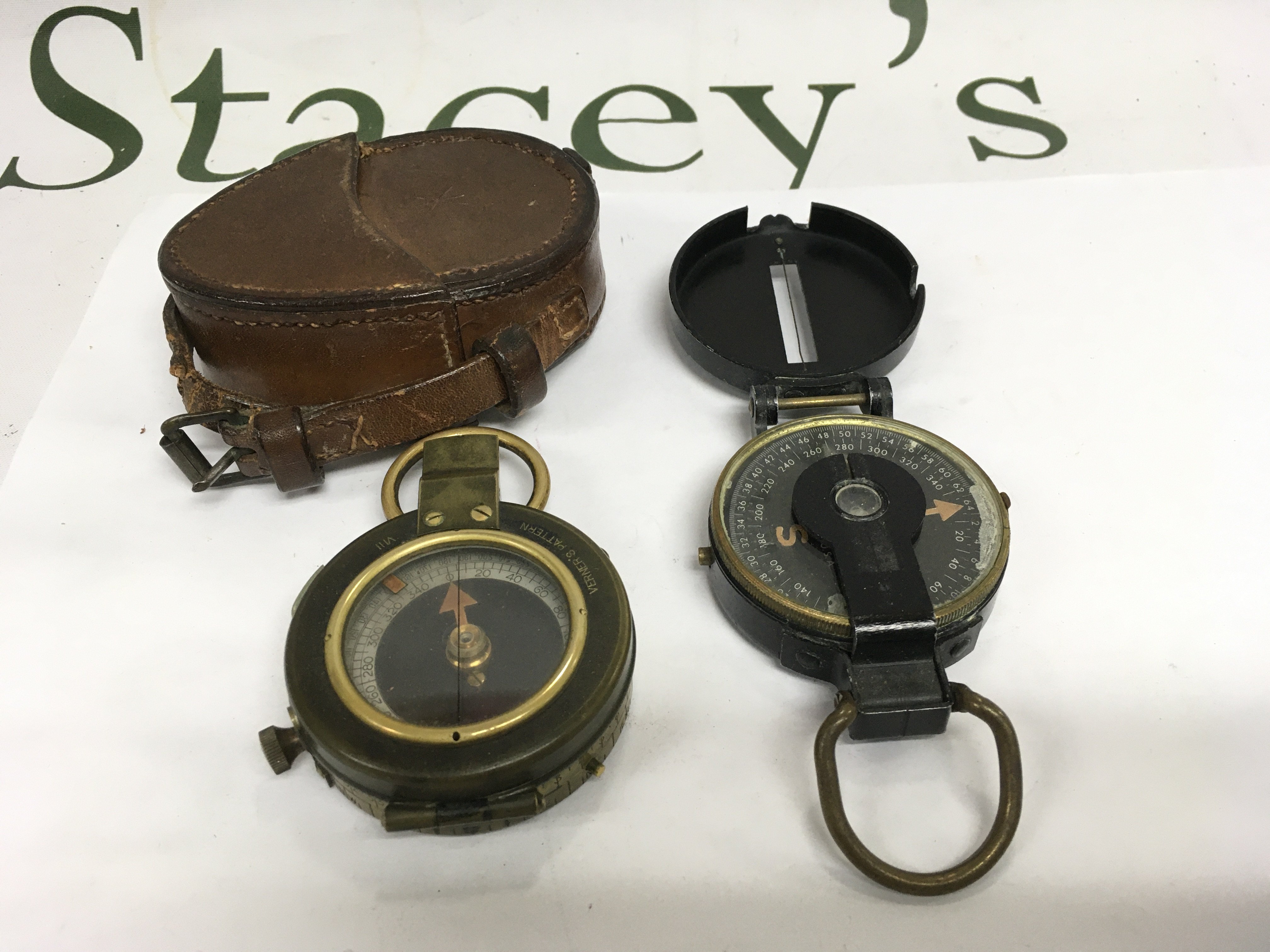 Two WW1 and WW2 military compasses. Shipping category D.
