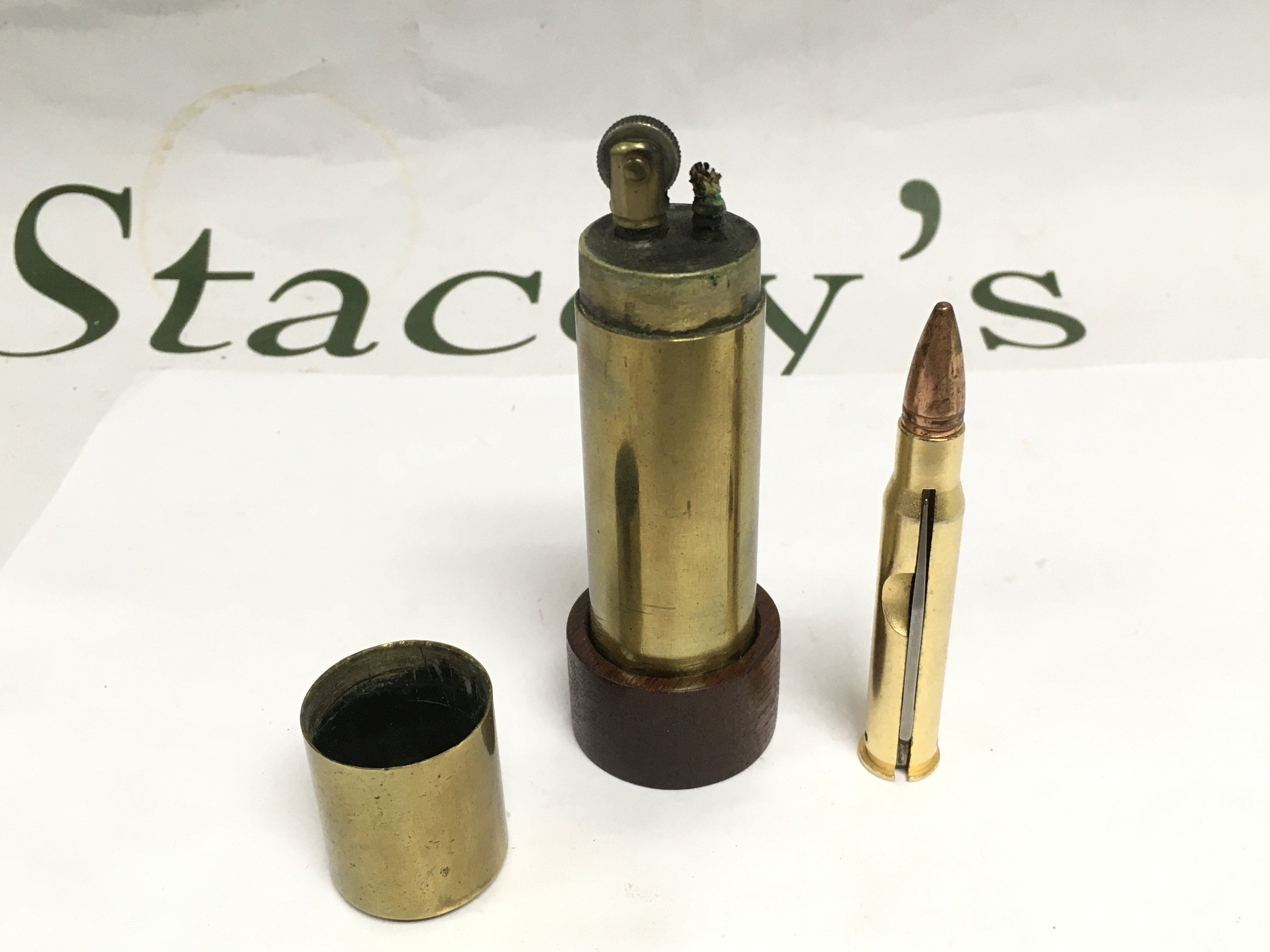 A trench art lighter and a penknife (2). Shipping category D.