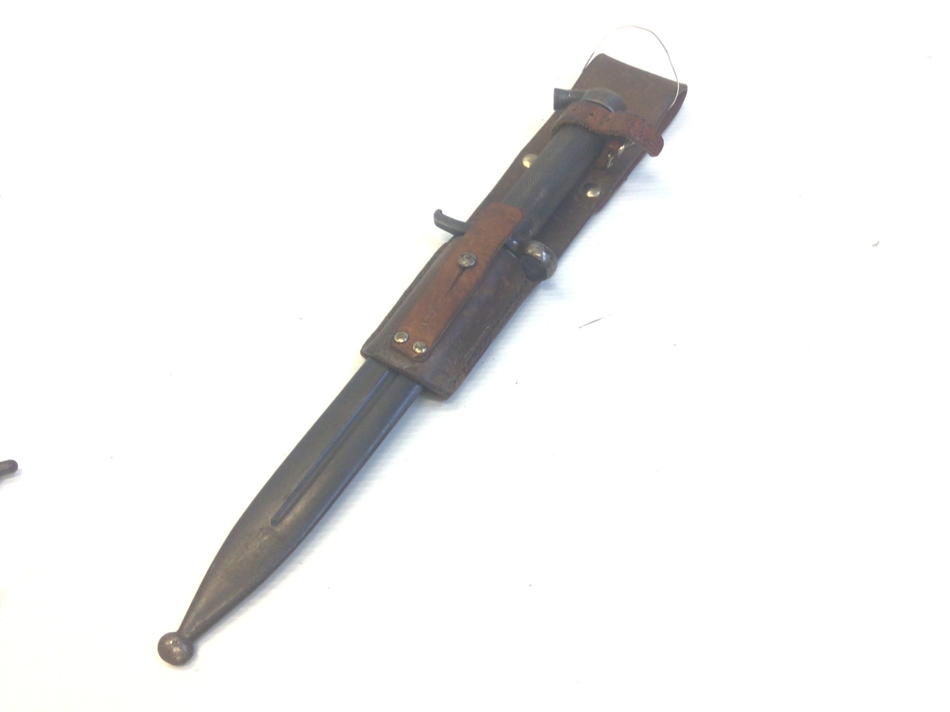 A Swedish 1890 bayonet. With leather frog.