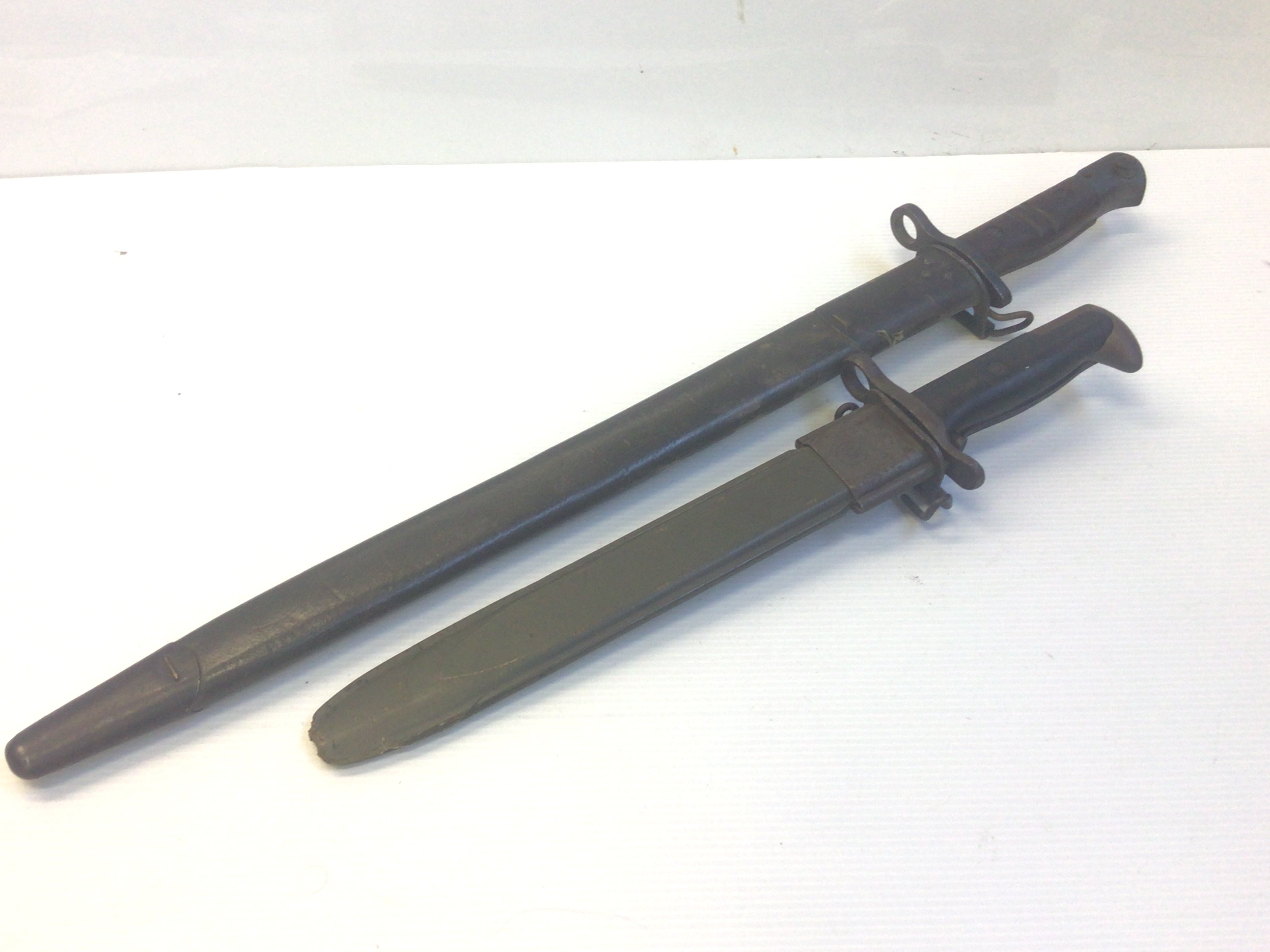 Two American Bayonets I world war 1917 Remington with US stamp and one other shorter bayonet AFH US.