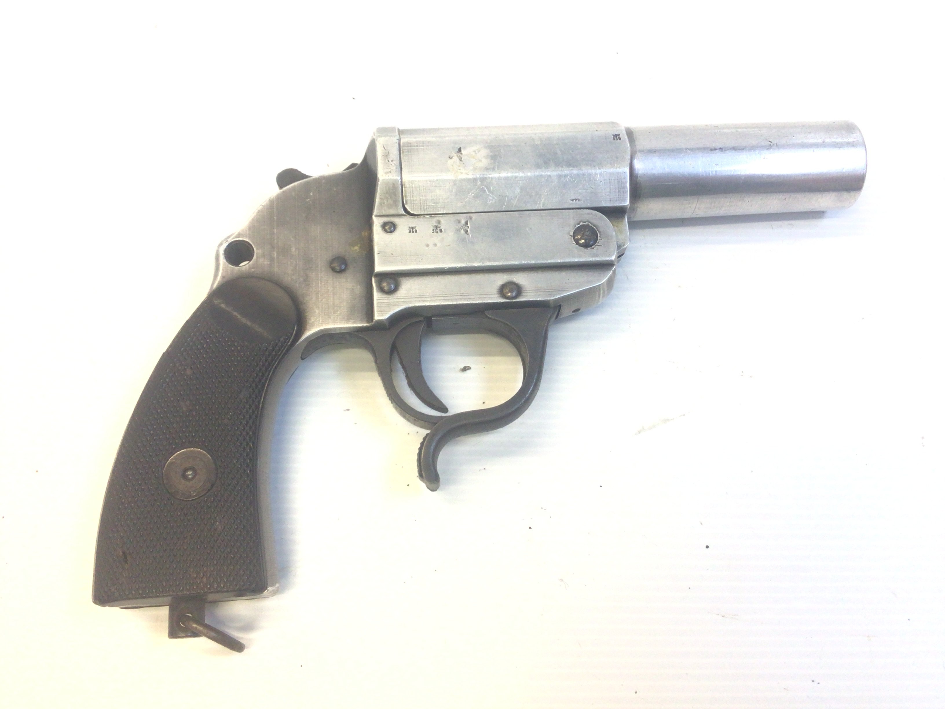 A Rare Deactivate German Third Reich Luftwaffe flair pistol. Light weight aluminium. With German Swastika. Provenance The German Aircraft crashed on a house at Teignmouth Rd Torquay The pilot killed 30/May/1943.