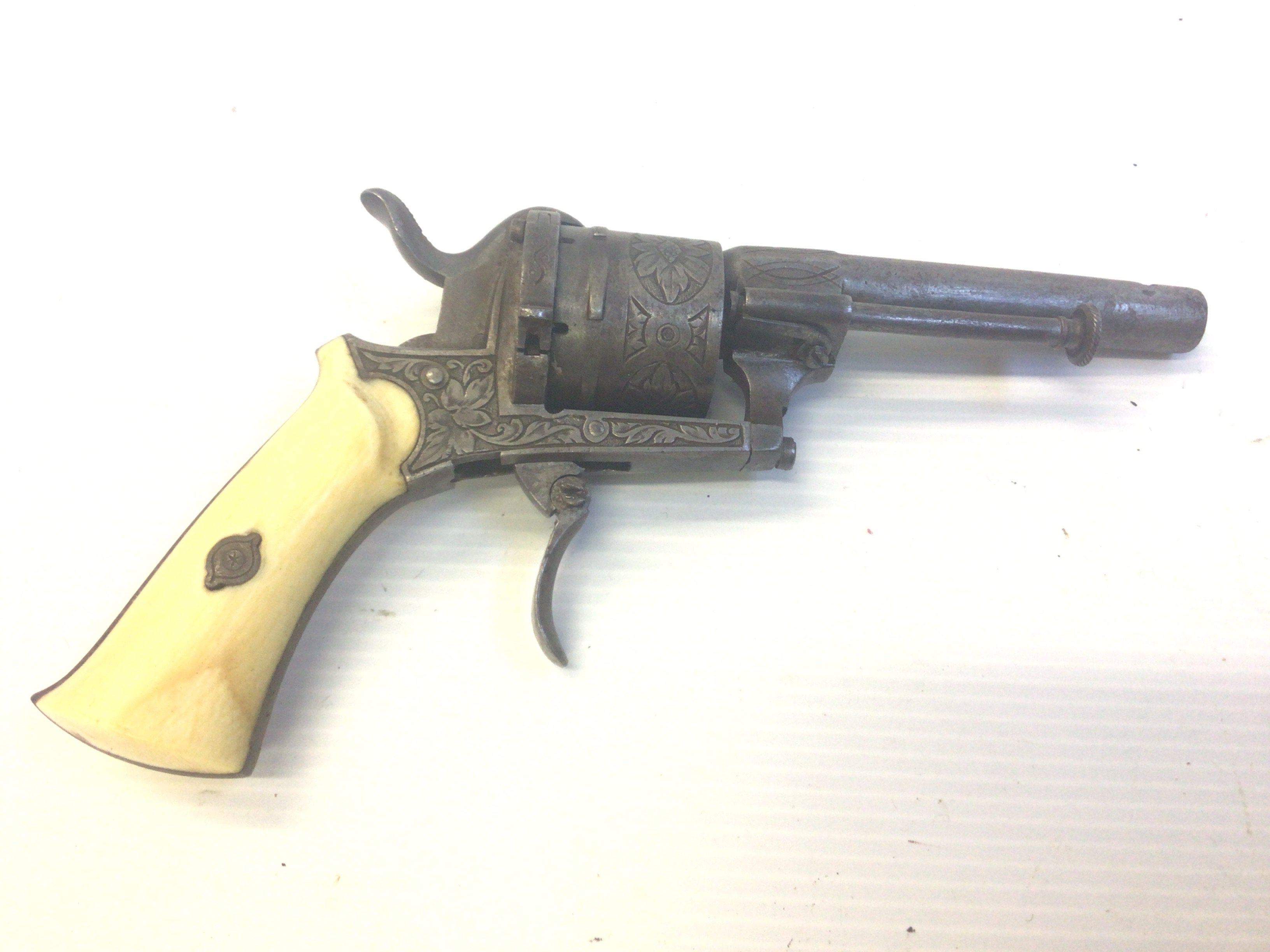 A 19th century Belgium rim fire revolver with an engraved action.