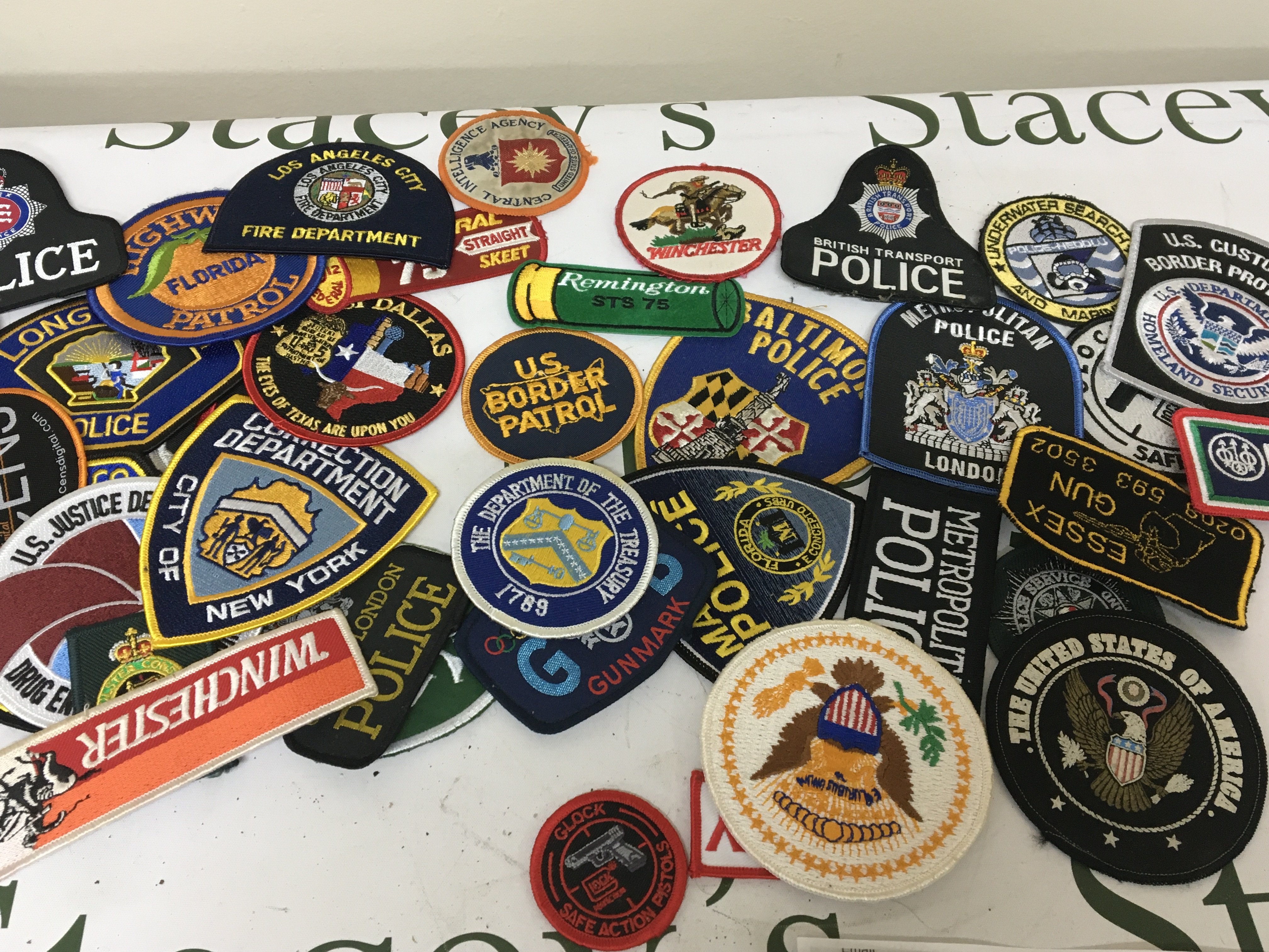 A Collection of Cloth badges American Police and others.